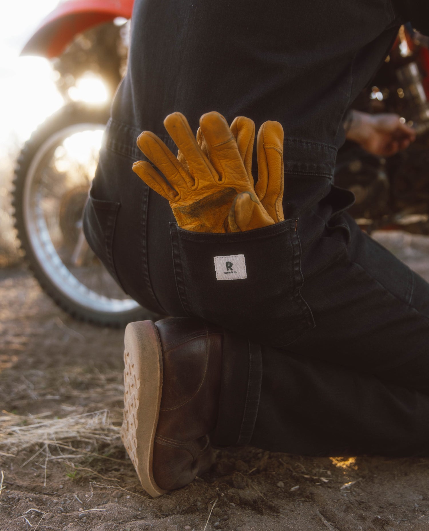 Gloves in a pocket of a coverall