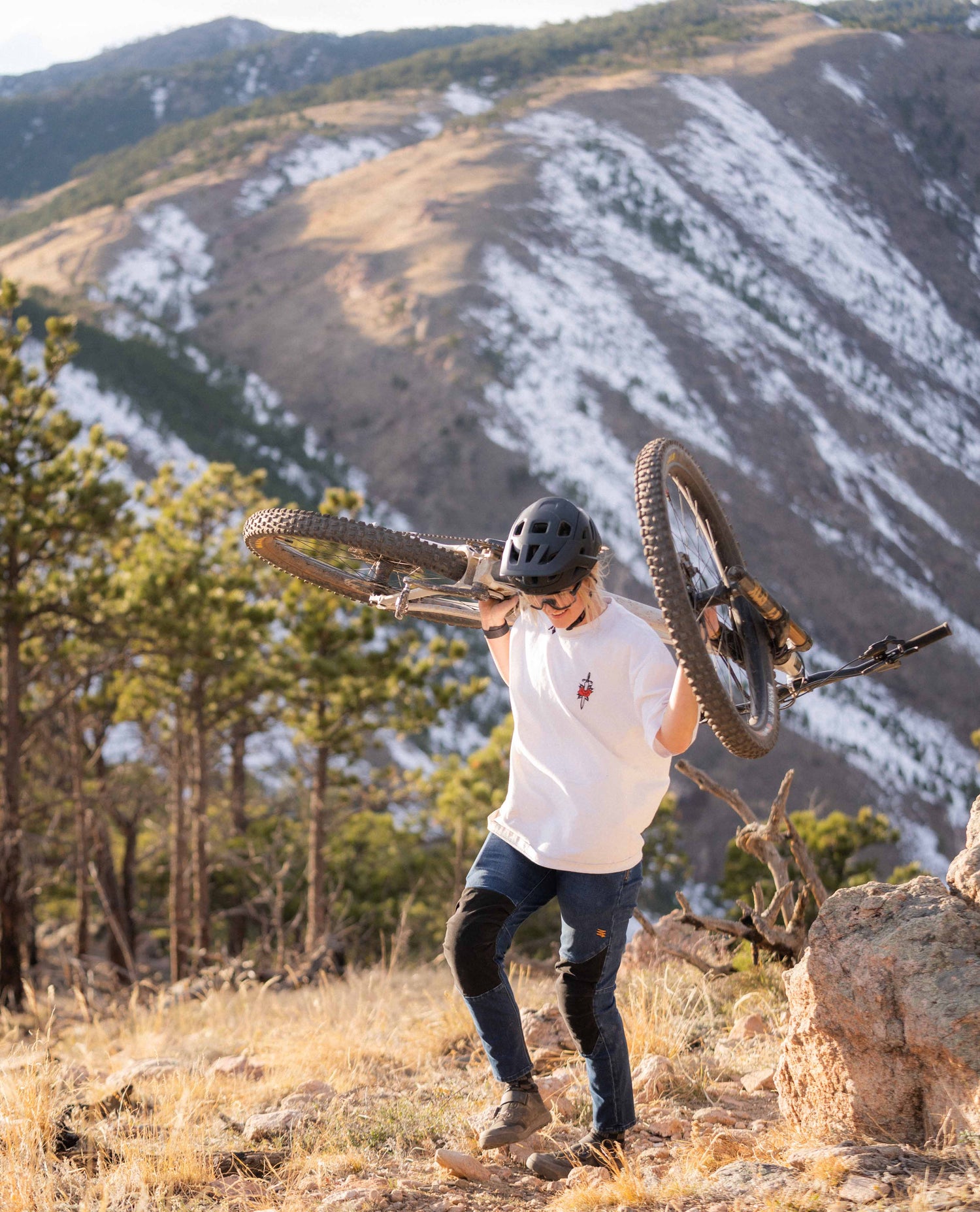 Hiking up a mountain in Women's Denim Bike Pant