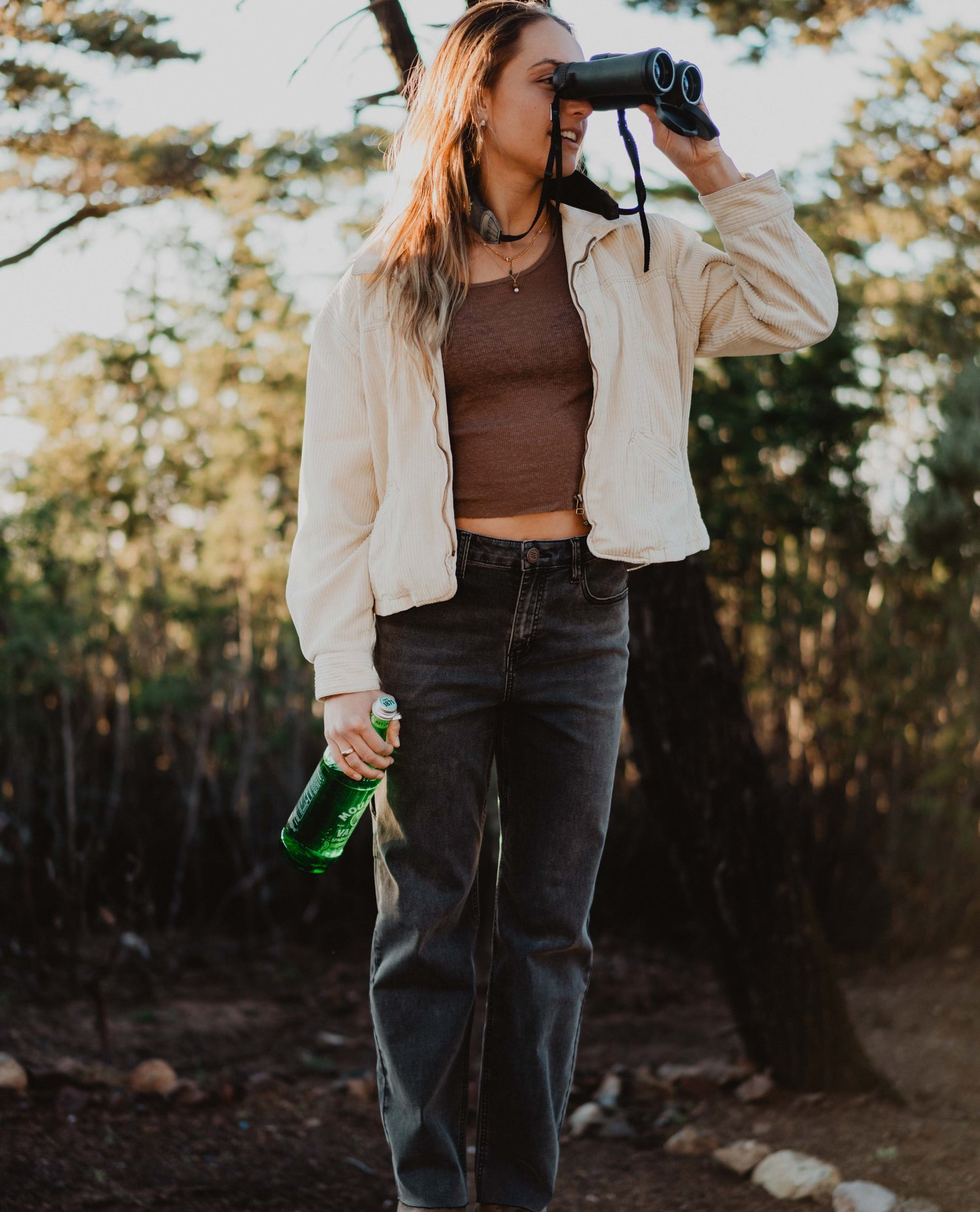 woman using binoculars