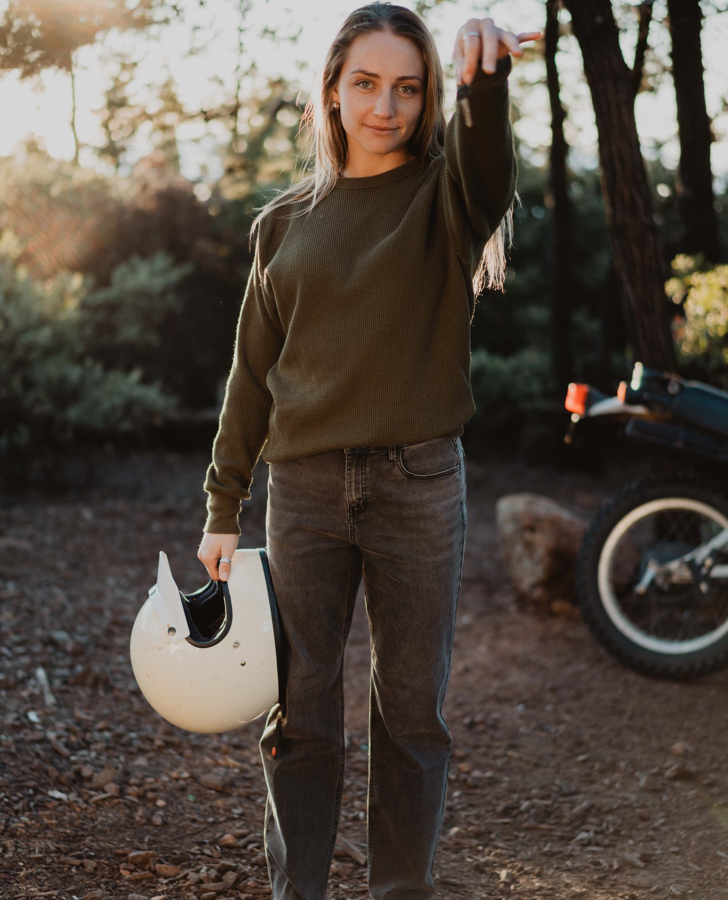 woman holding motorcycle keys