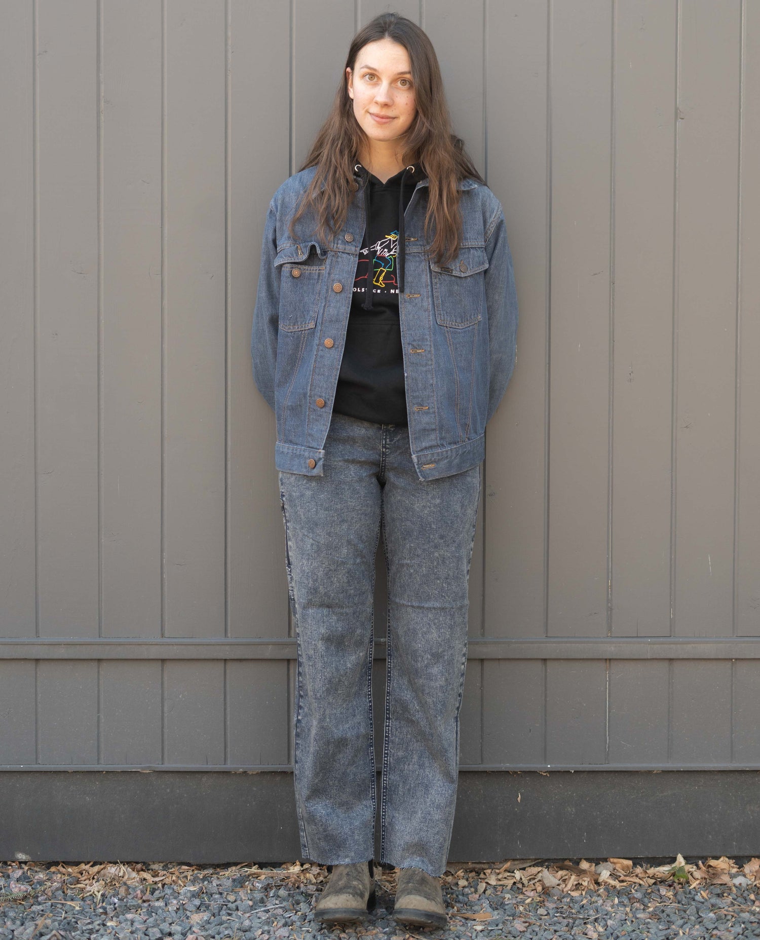 Woman leaning on wall