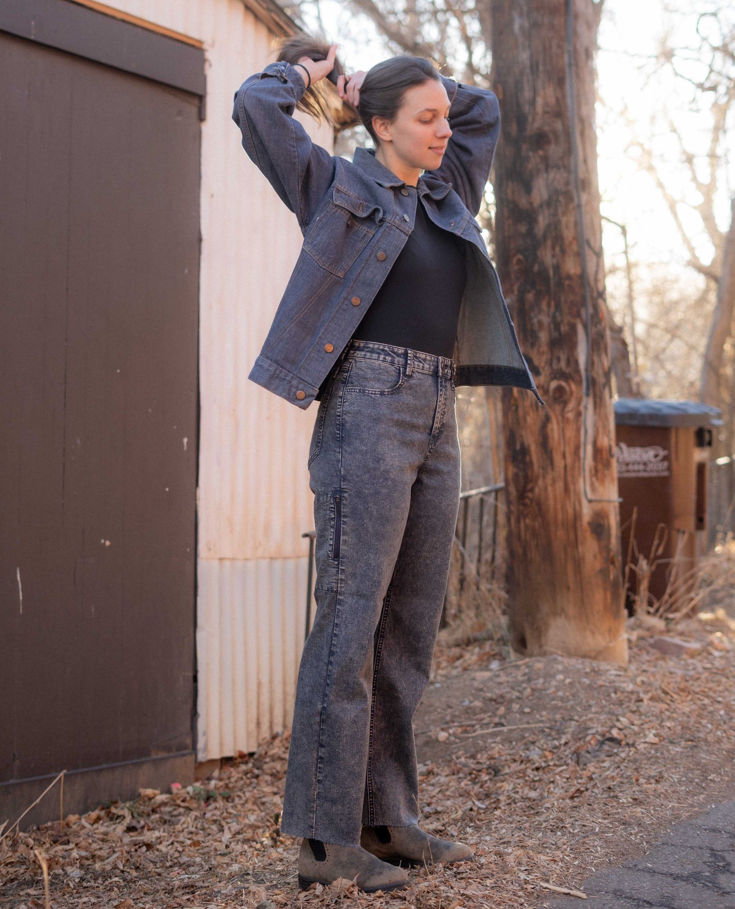 Woman fixing her ponytail