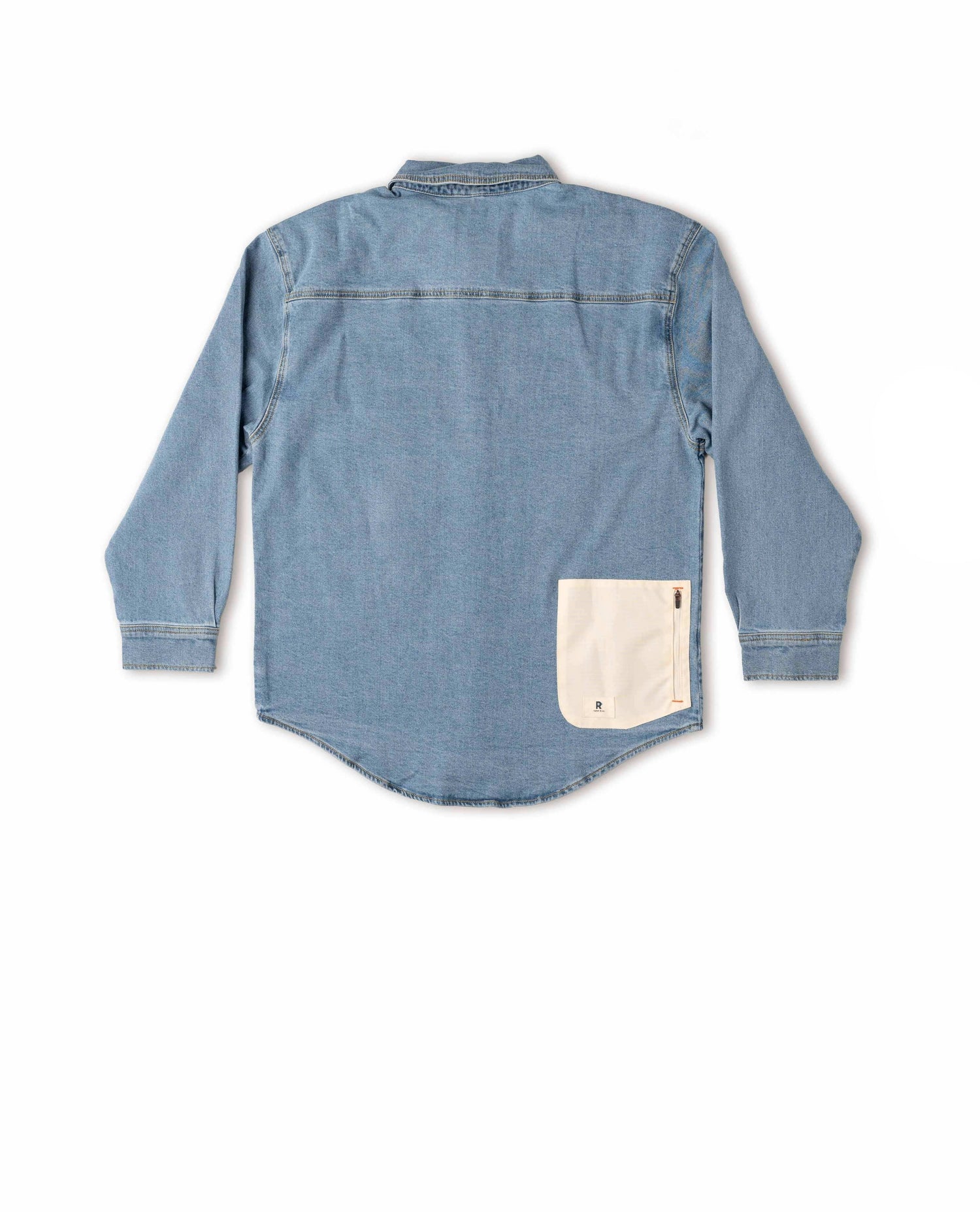 Blue denim shirt with a pocket on a white background