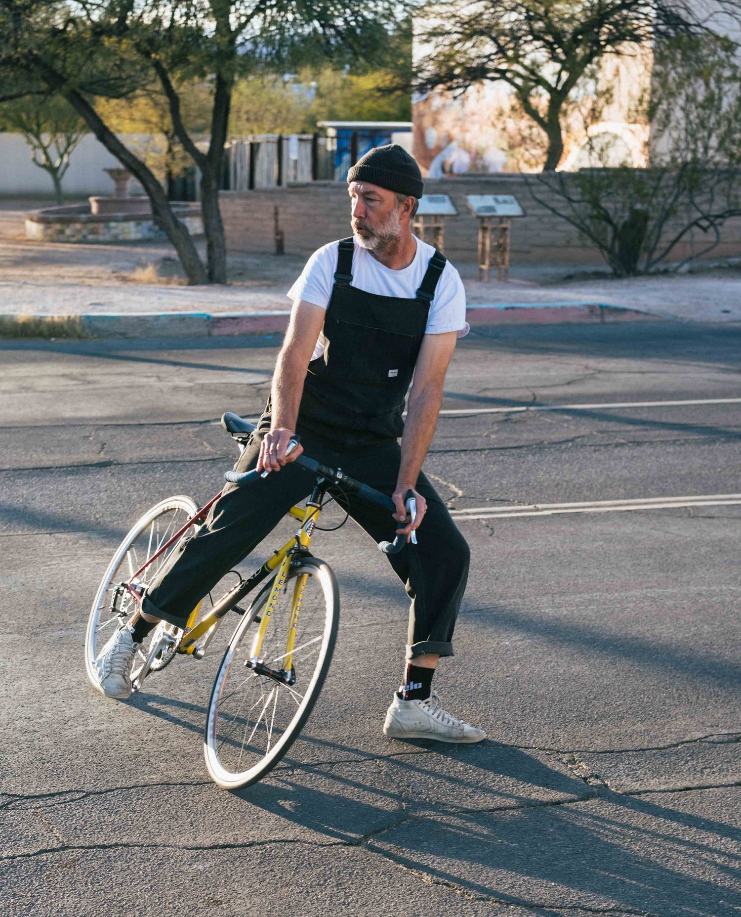 Curtis ripping around on a vintage bike in Superlite overalls