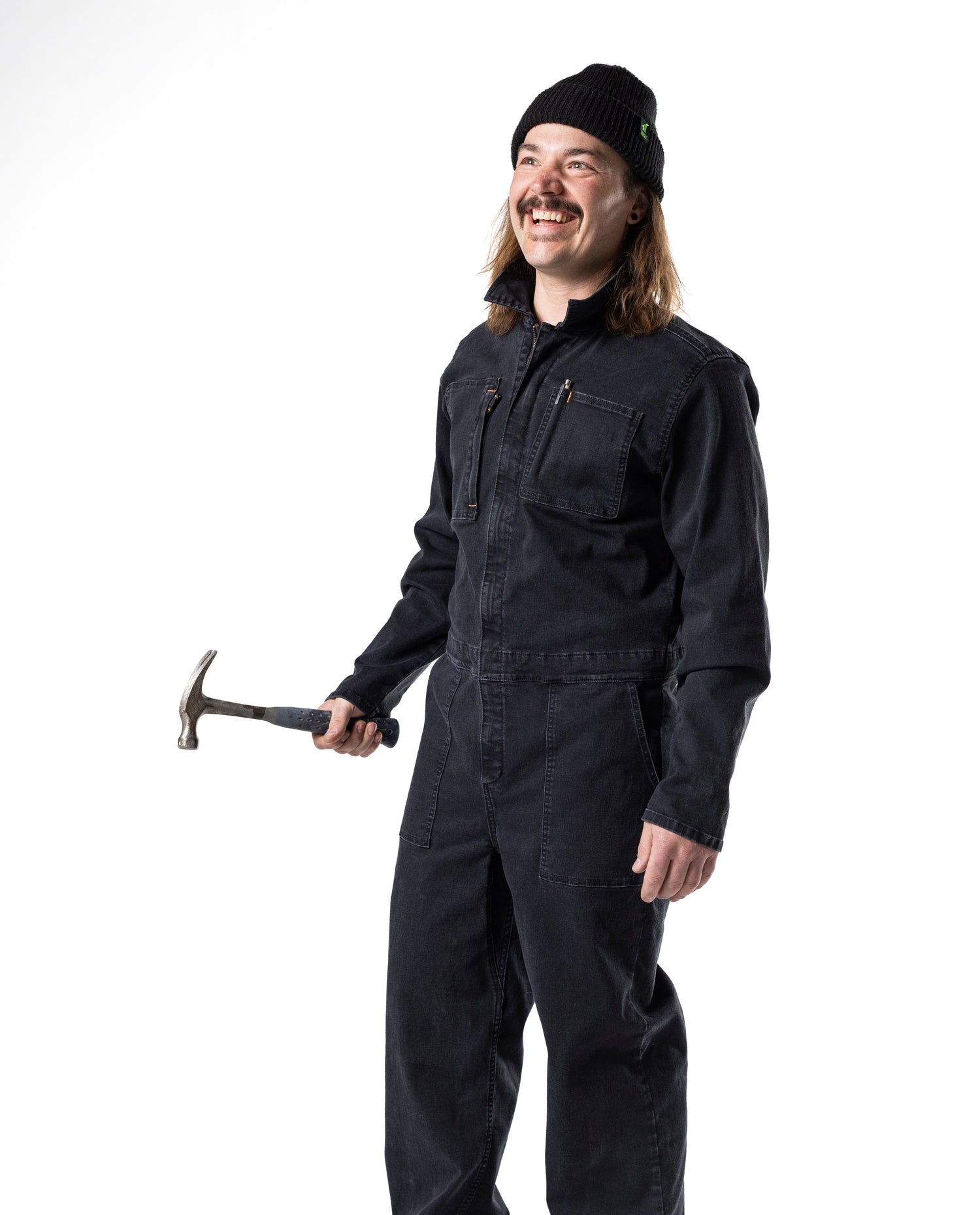 Guy with a hammer in coveralls