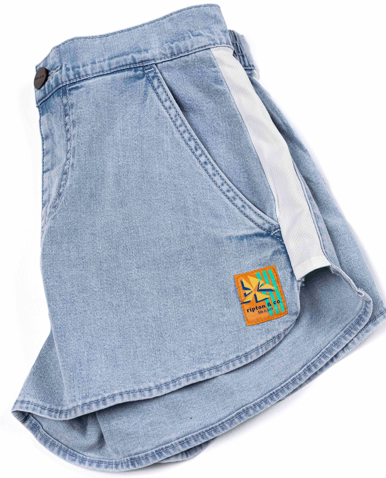 Light wash court jorts in studio side detail