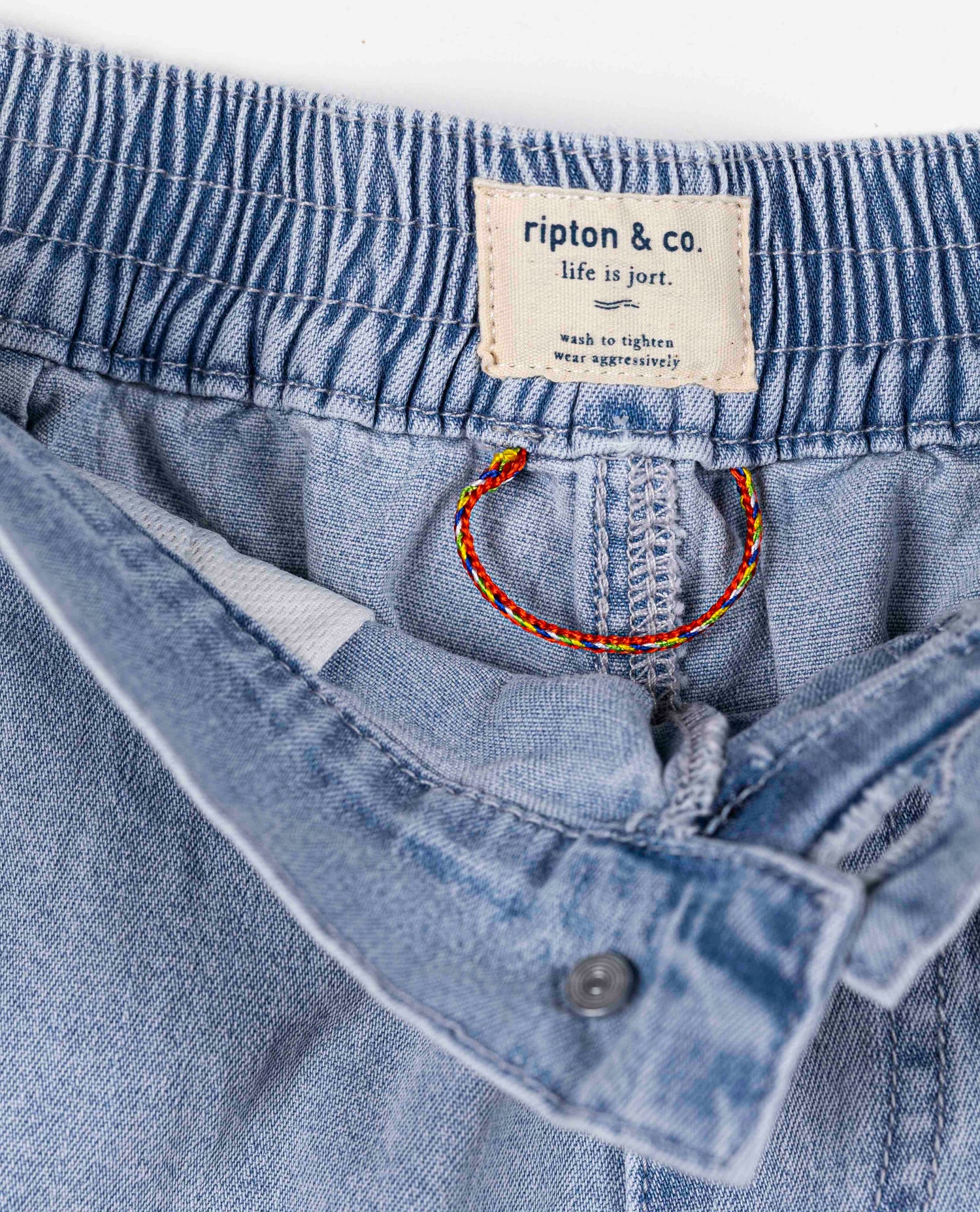 Light wash court jorts in studio waist detail