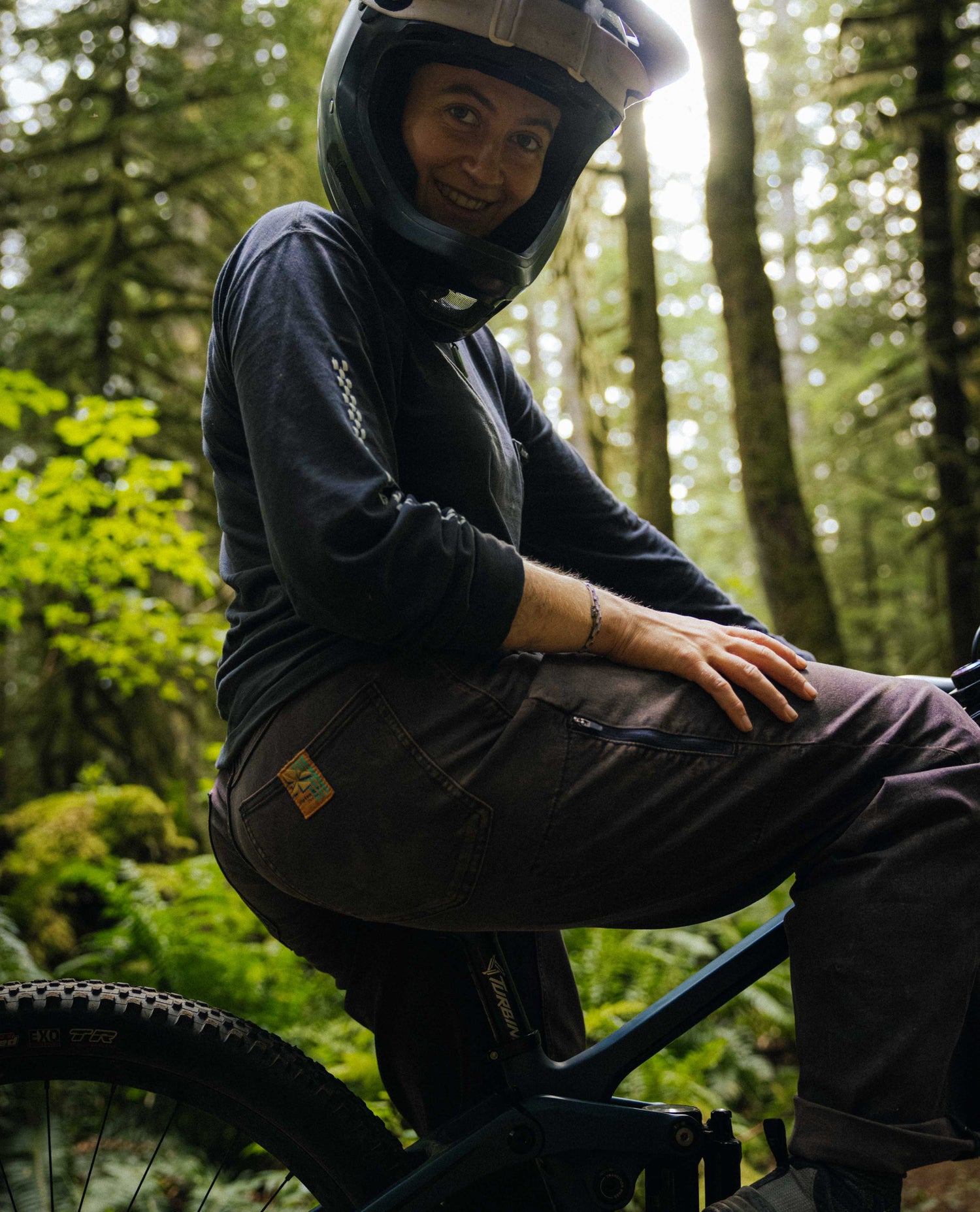 Person on a bike in a forest setting