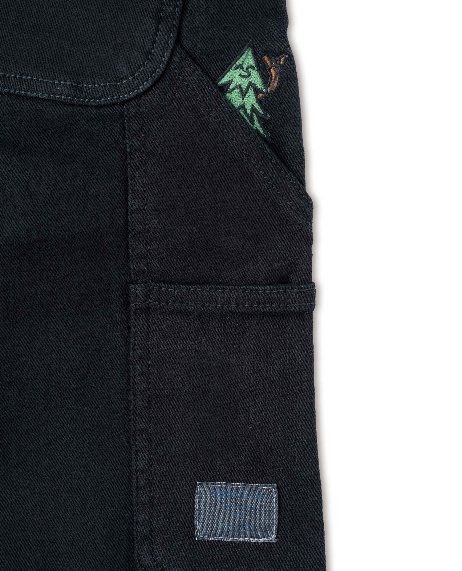 Studio shot of HAZ X Ripton Collaboration Pant (Rear Pocket Patch and Graphic Detail)