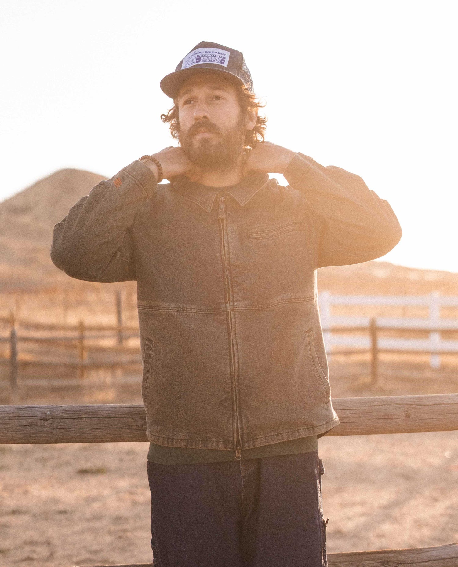 Man standing in Dirty Dave sport utility jacket.