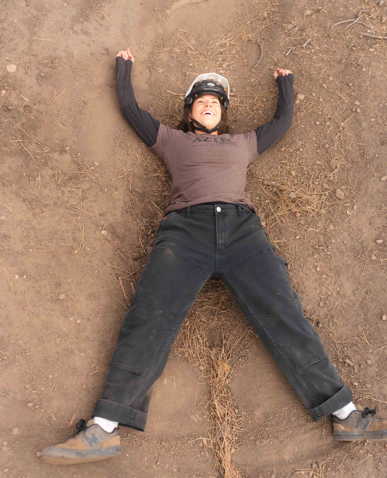 Rivers lying on the ground in black utility