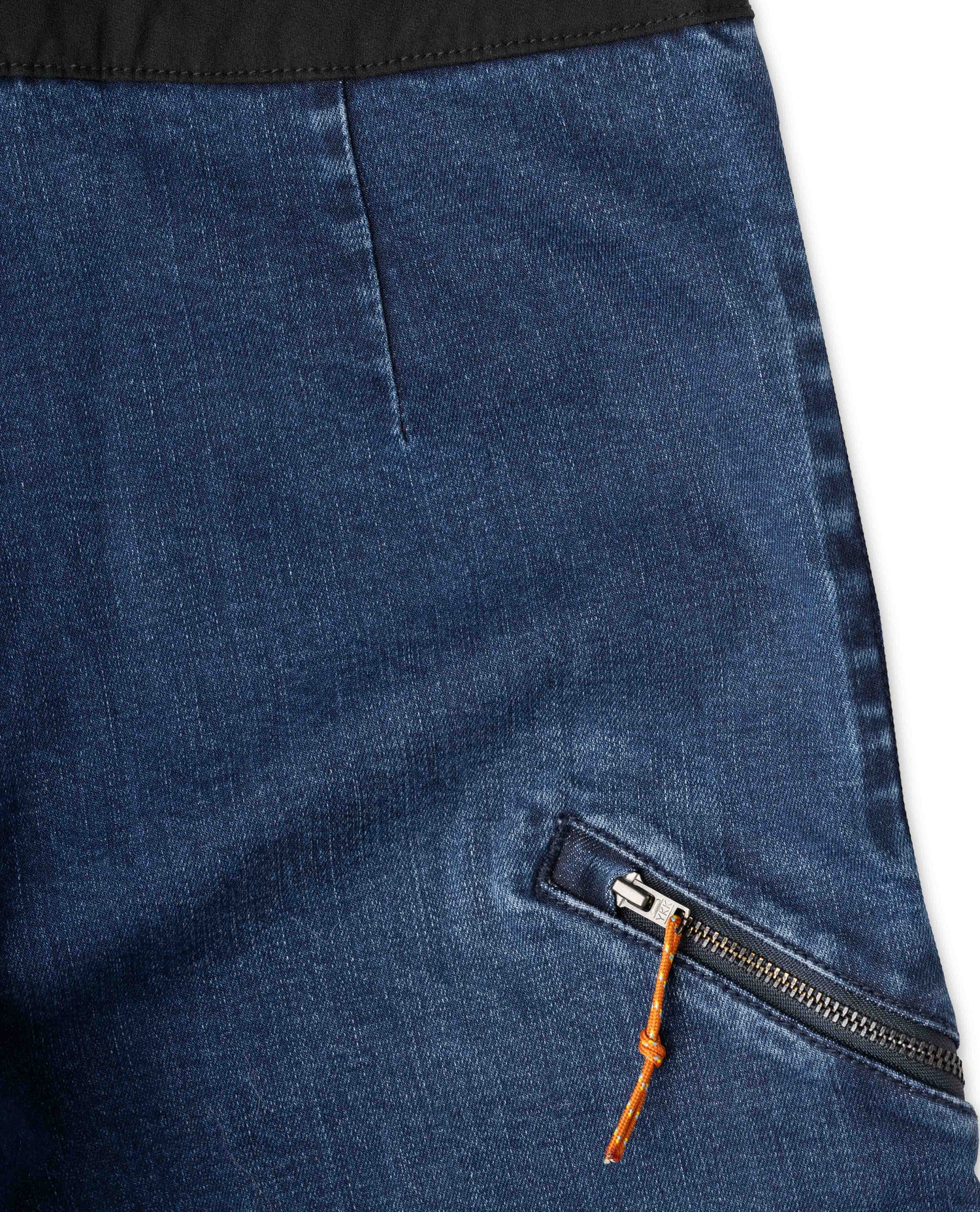 Women's Denim Bike Pant in studio pocket detail