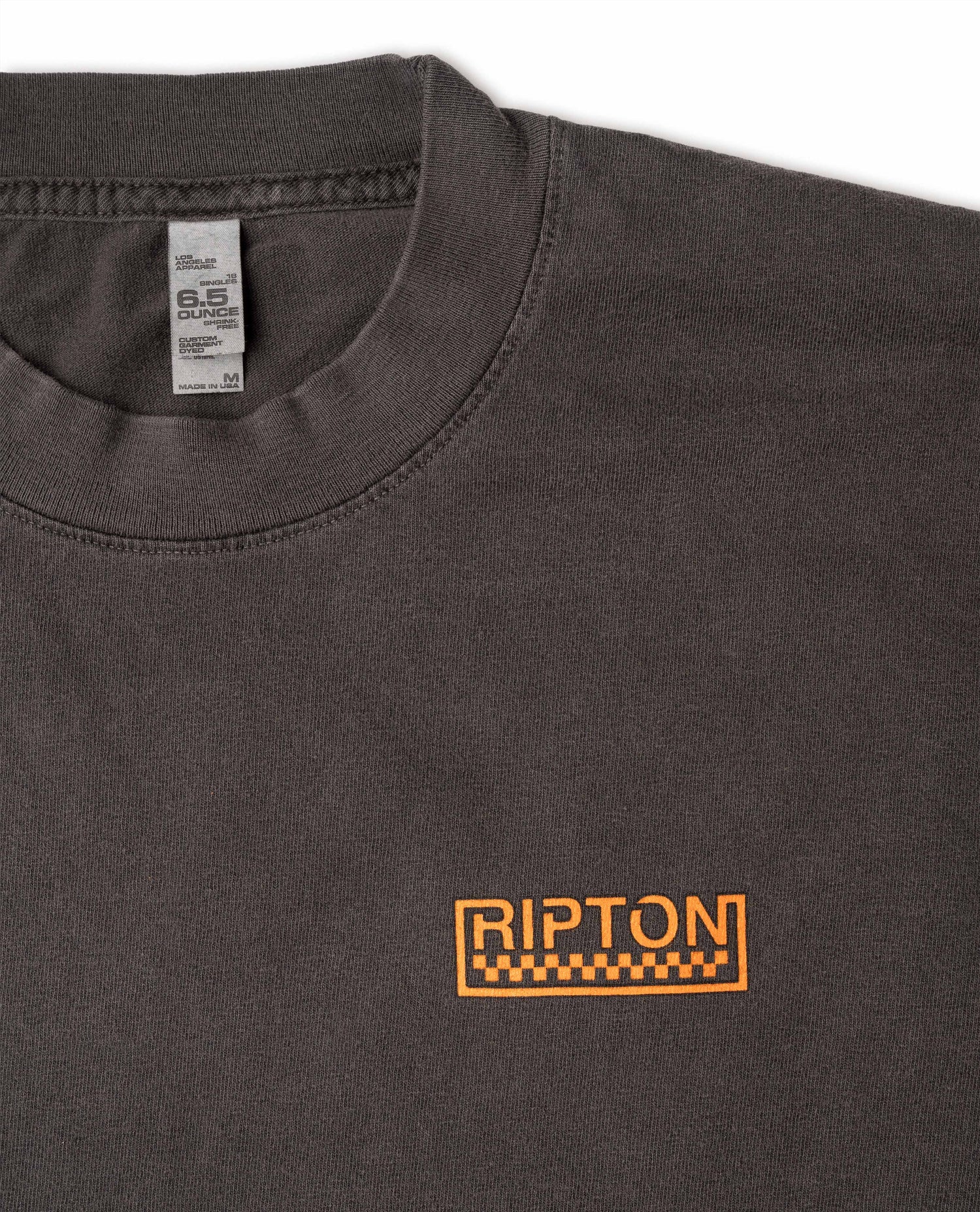 Gray t-shirt with orange 'Ripton' logo on a white background