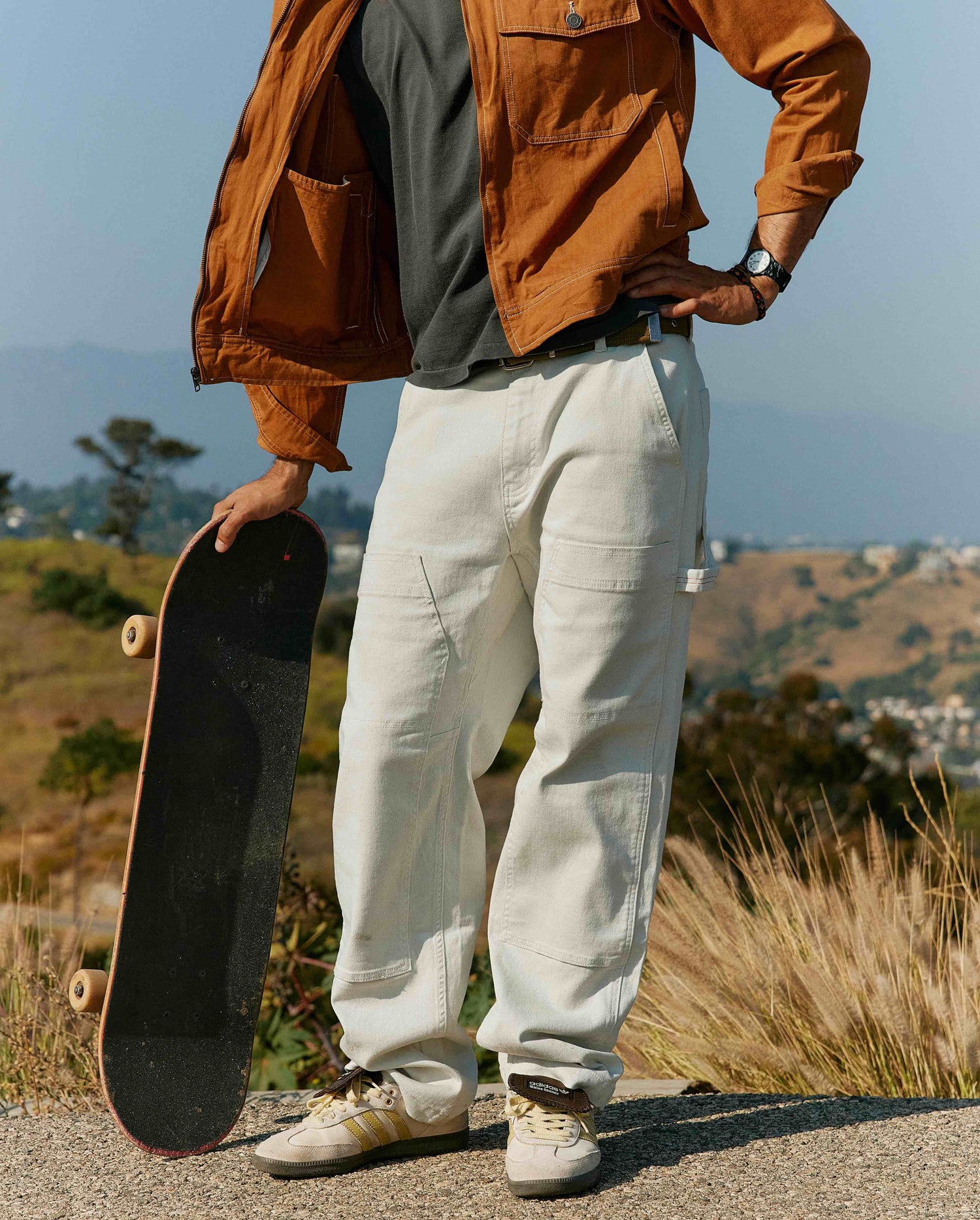 Skateboarder in bone sport utility pant