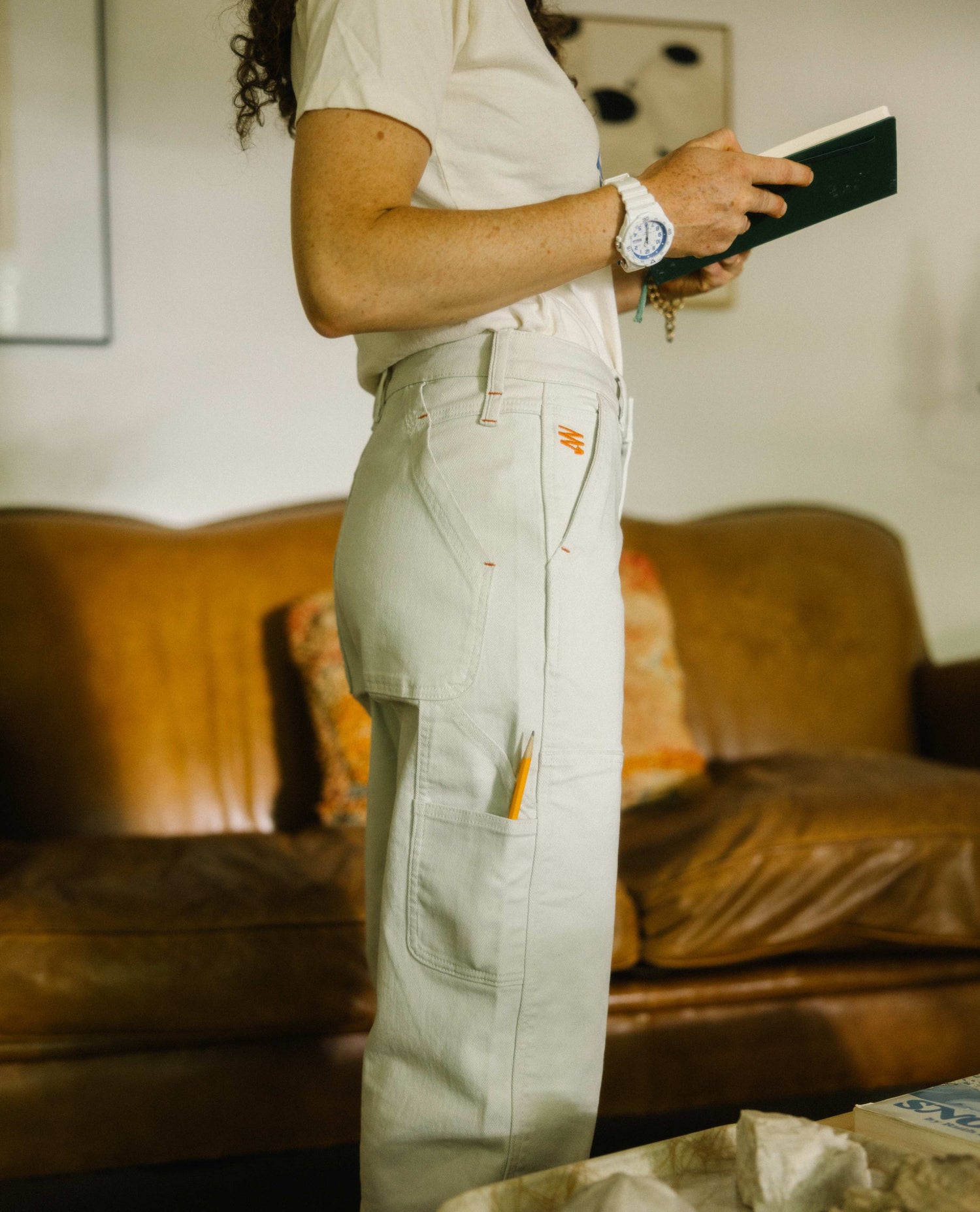 woman in white sport utility pants