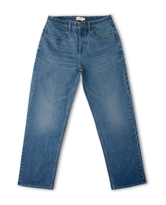 Medium wash jeans front view on white background