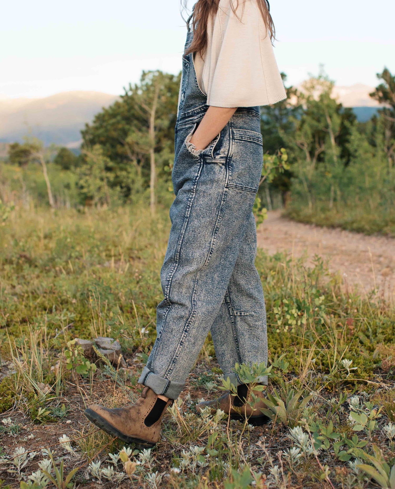 Girl wearing Starving Jartist Overalls