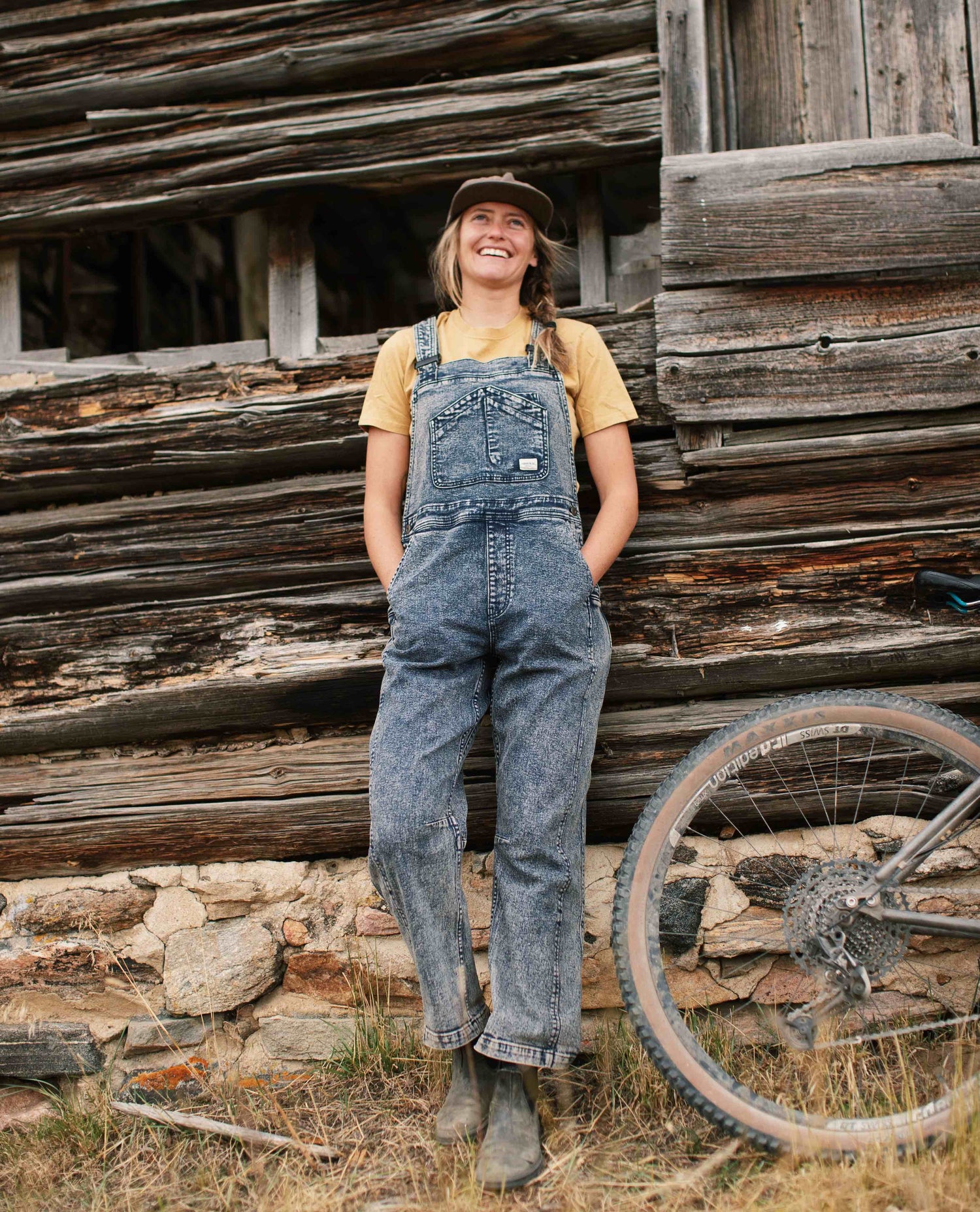 mountain biker wearing Starving Jartist Overalls