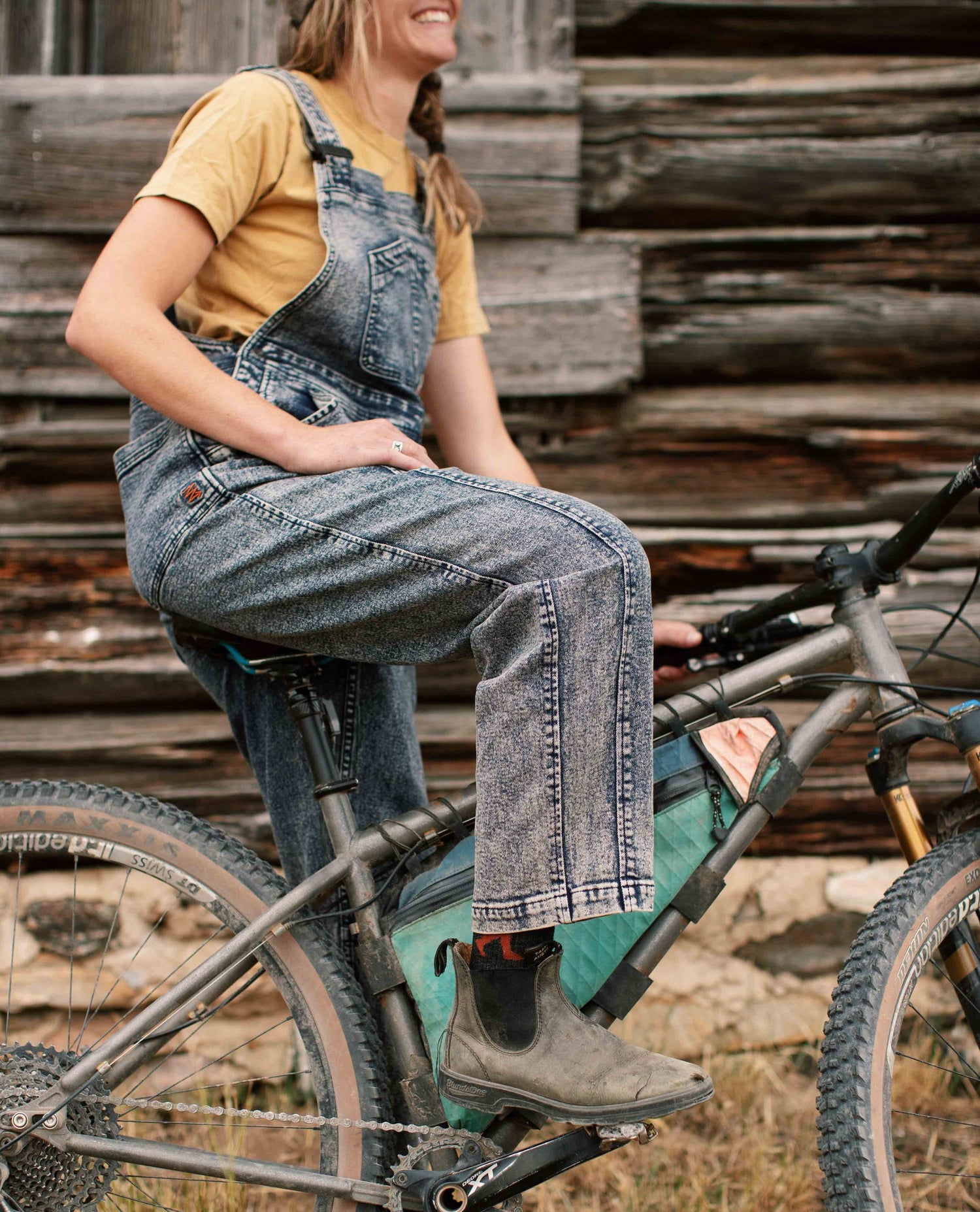 mountain biker wearing Starving Jartist Overalls