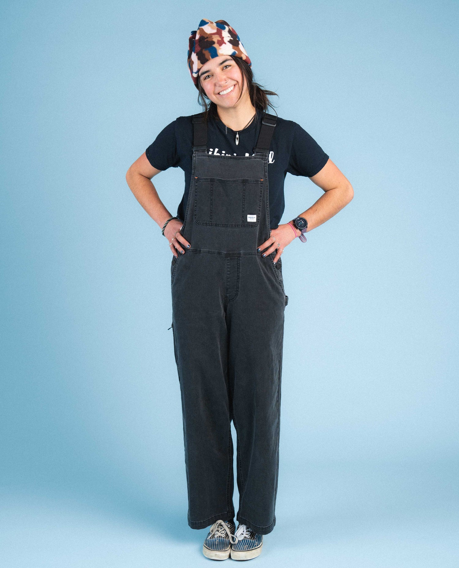 Ari in studio wearing Superlite overalls 