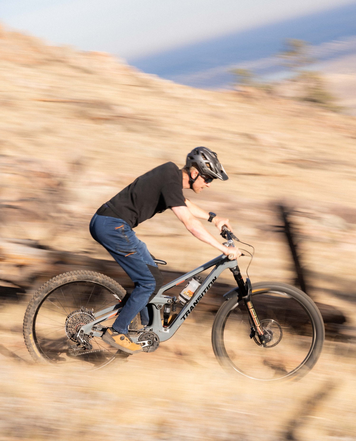 Riding a mountain bike fast in Men's Denim Bike Pant