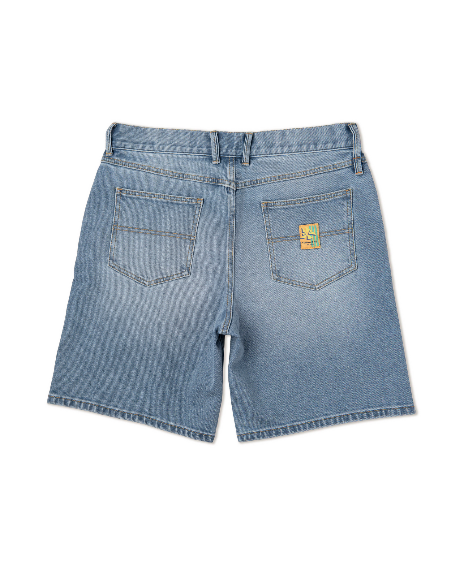 A flay-lay photo showing a pair of light wash Ripton jorts.