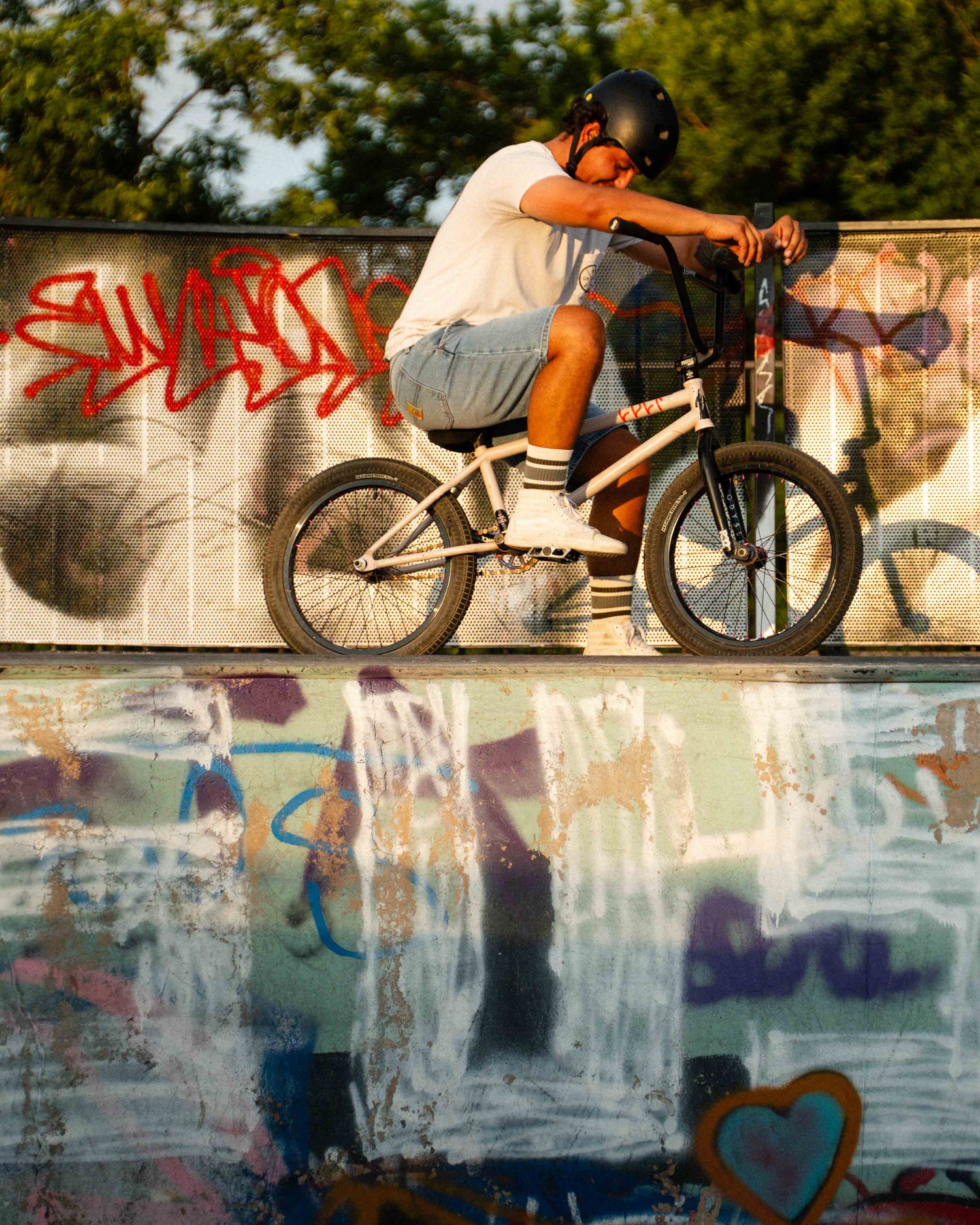 rider sitting in jorts