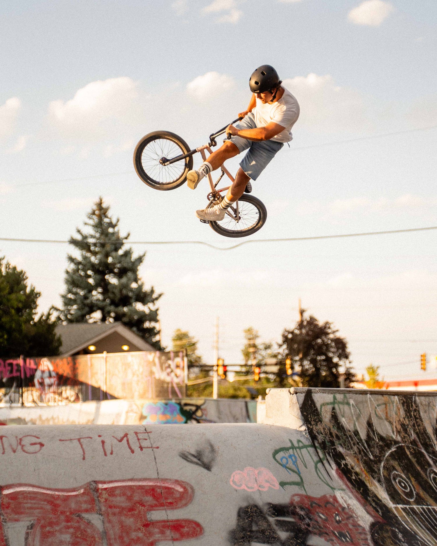 rider in jorts getting big air