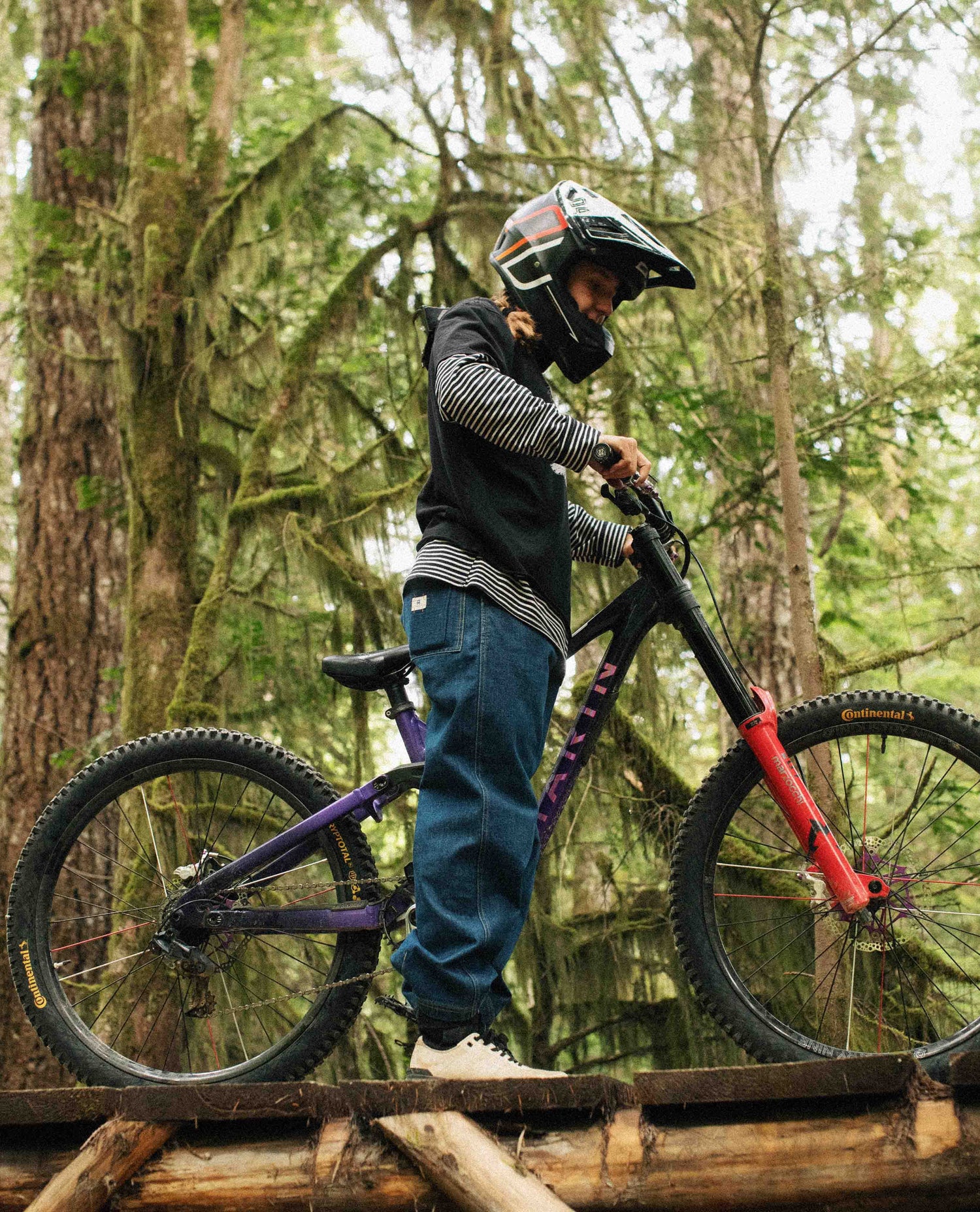 Person on a mountain bike in a forest setting