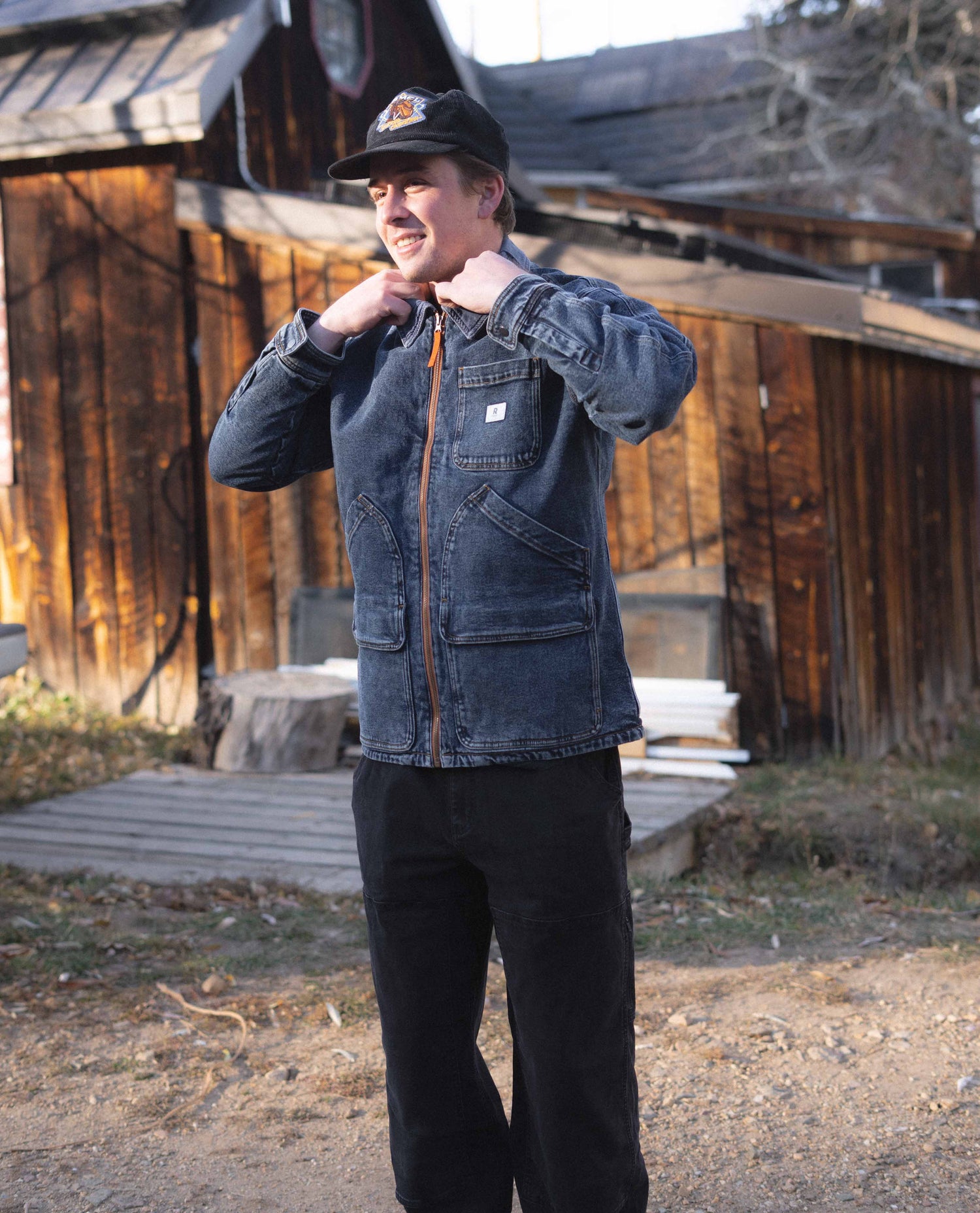 Guy wearing a denim jacket.
