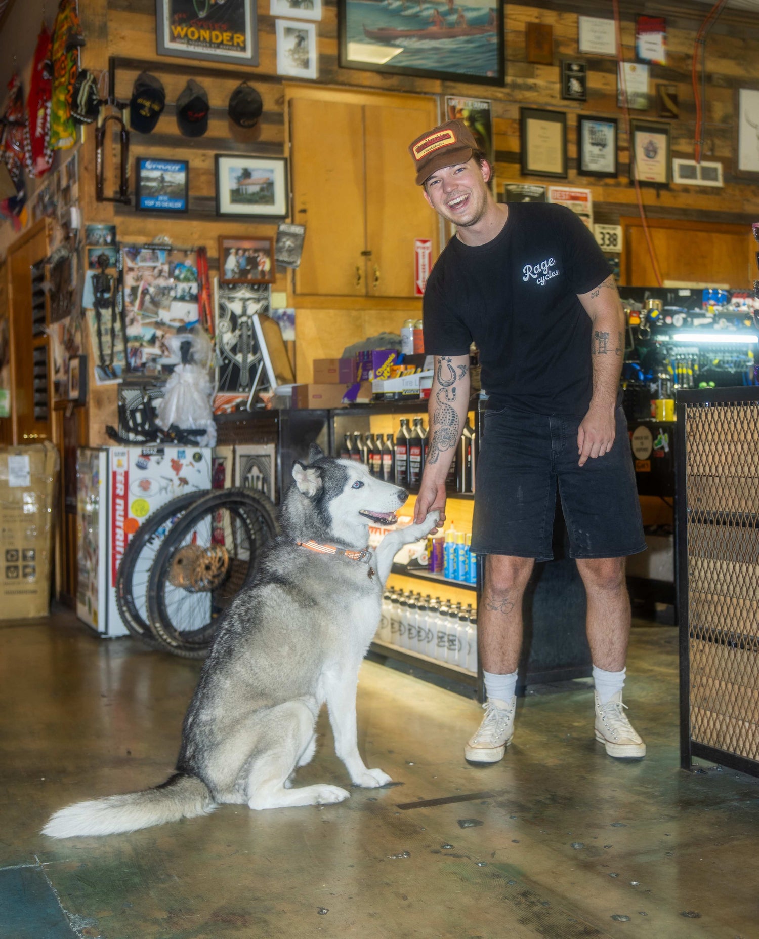 Man with a dog in a store setting