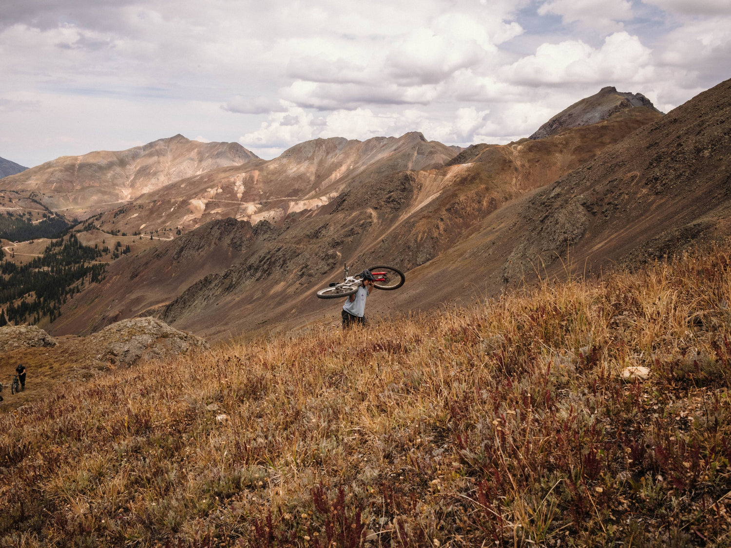 Janelle hiking up a big mountain
