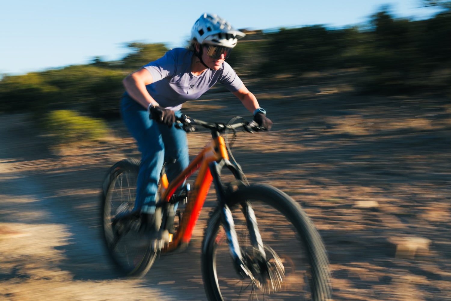 Jaz riding a mountain bike