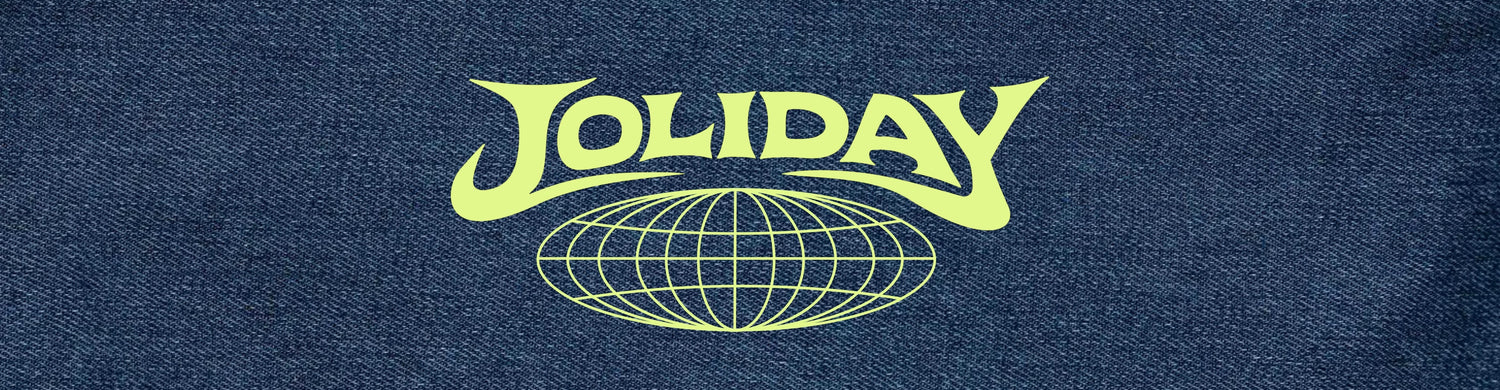 Yellow joliday logo and globe on denim background
