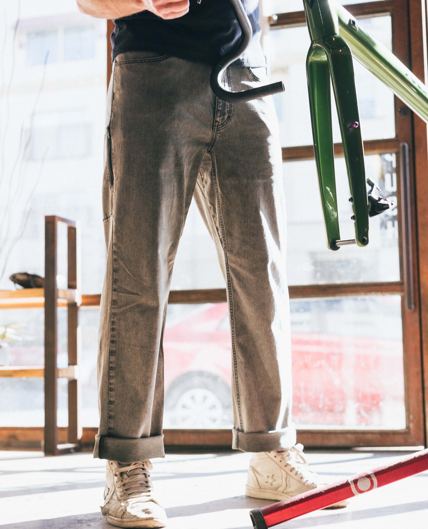 Curtis working on a bike in superlite jeans