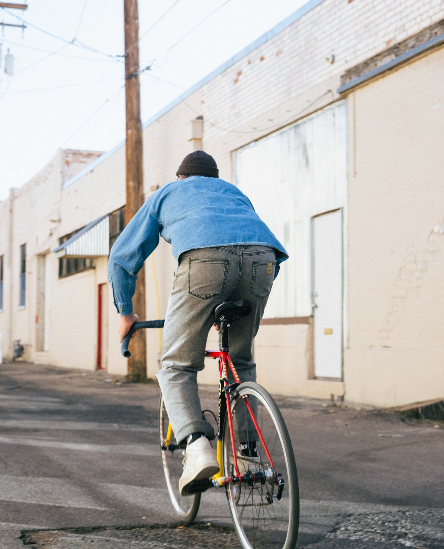 Turtle Superlite Jeans on a bike rider