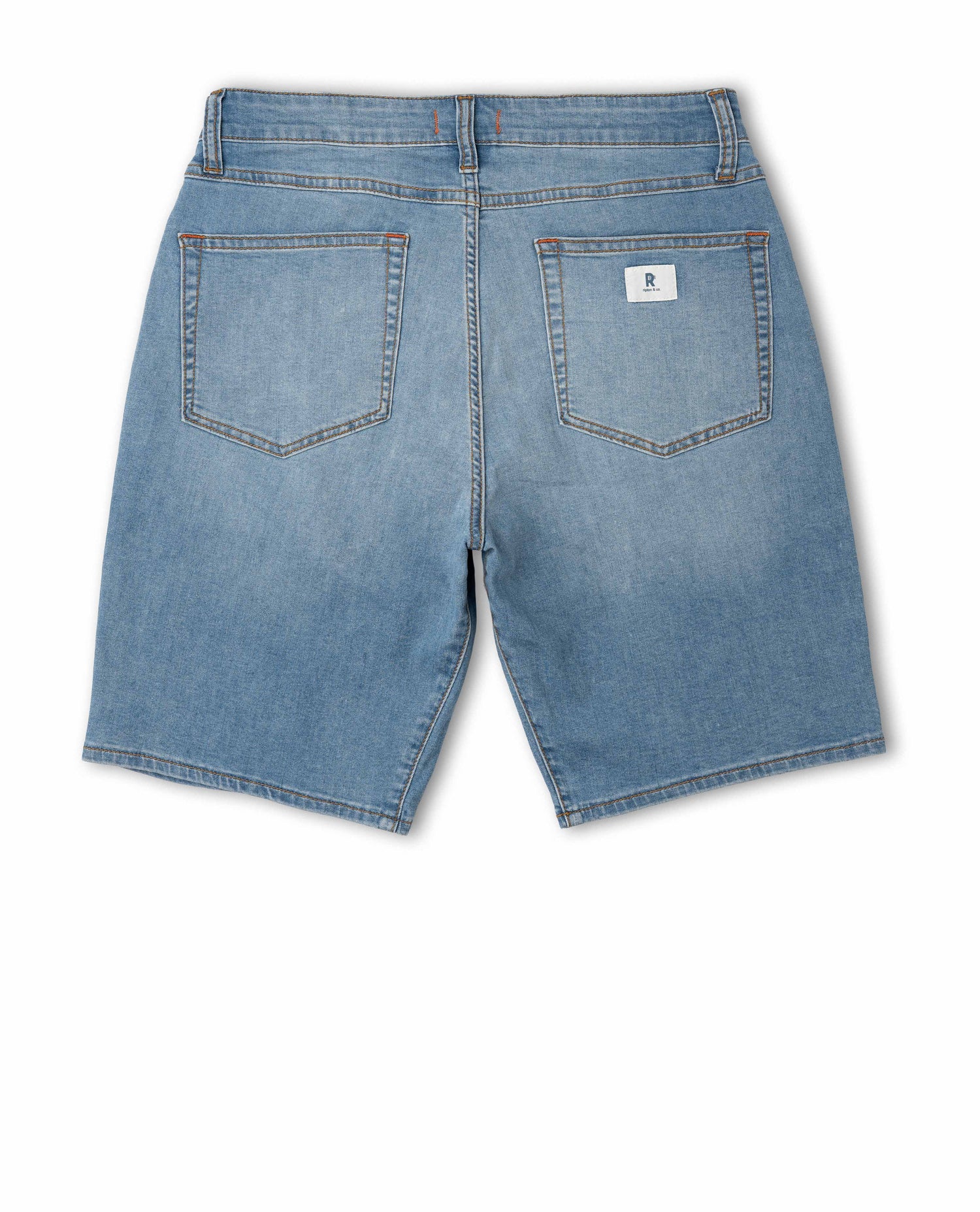 Blue denim shorts on a white background