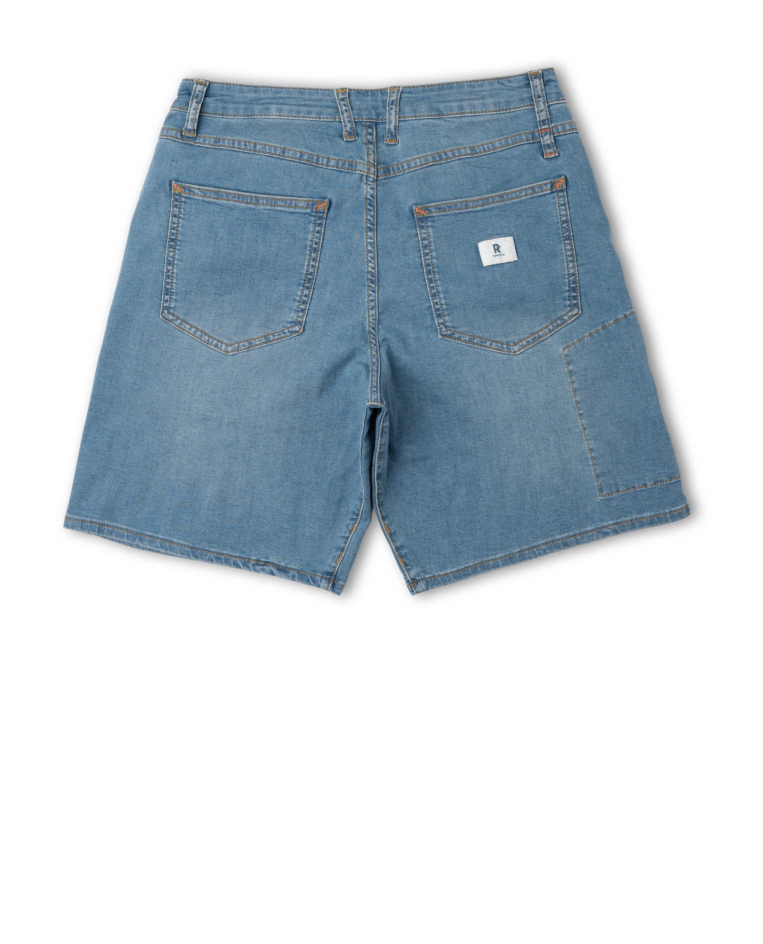 Blue denim shorts on a white background