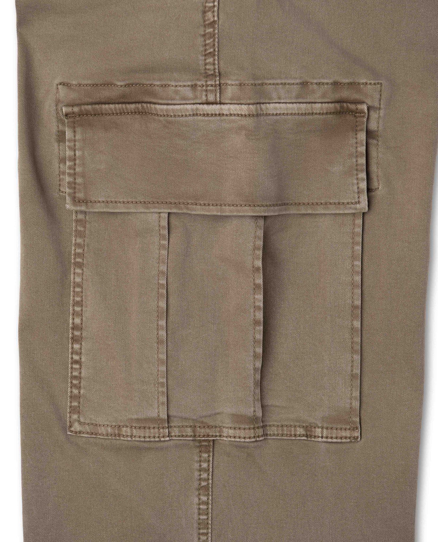 Close up of pocket on brown pants with white background
