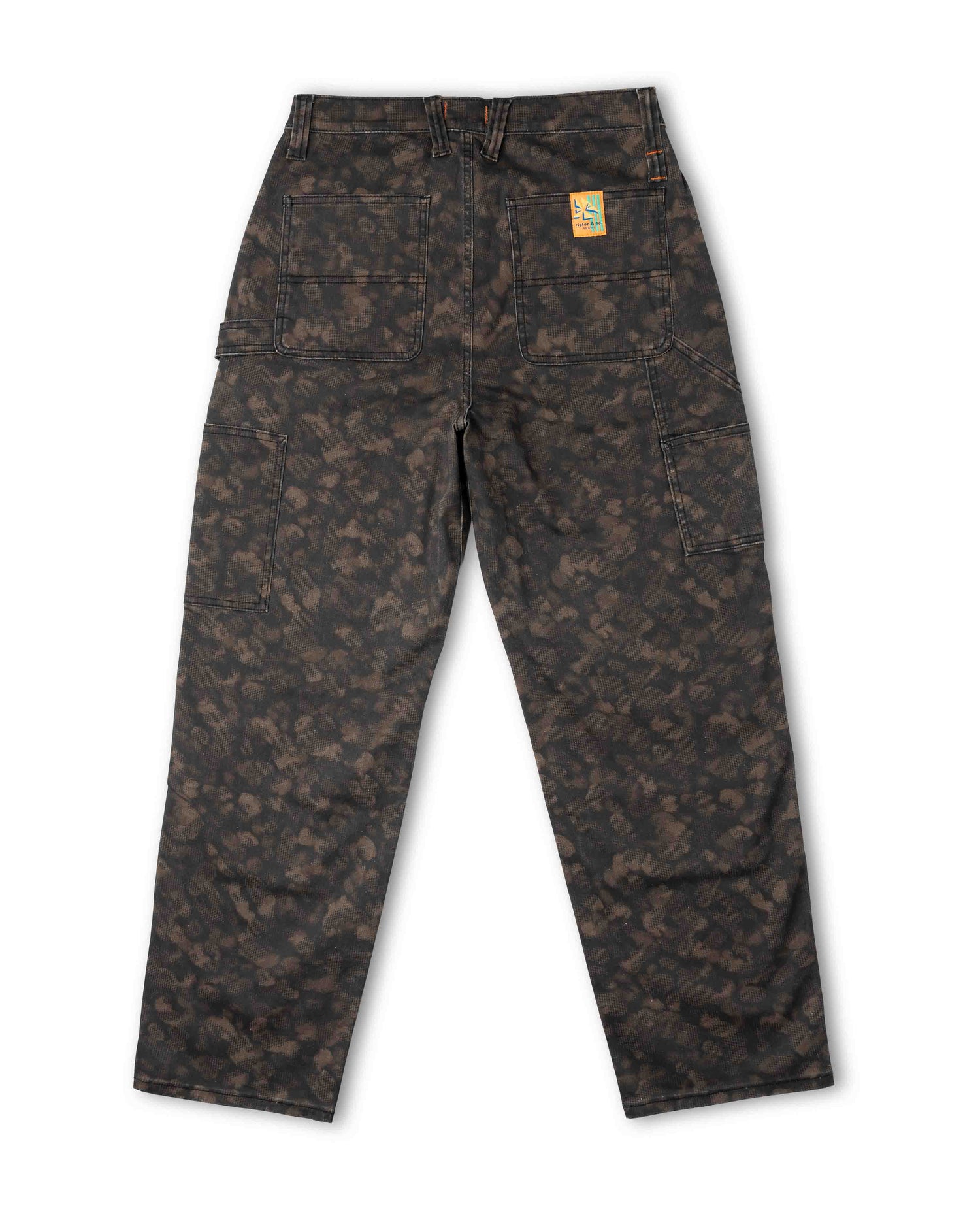 Camouflage pants laying on white background
