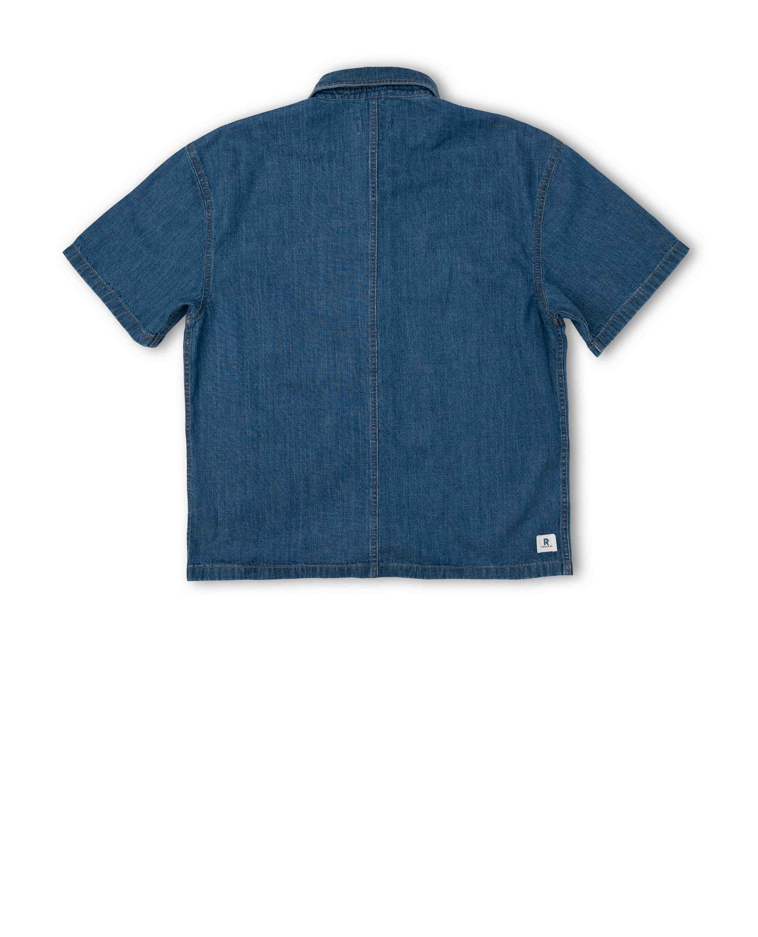 Blue denim shirt on a white background