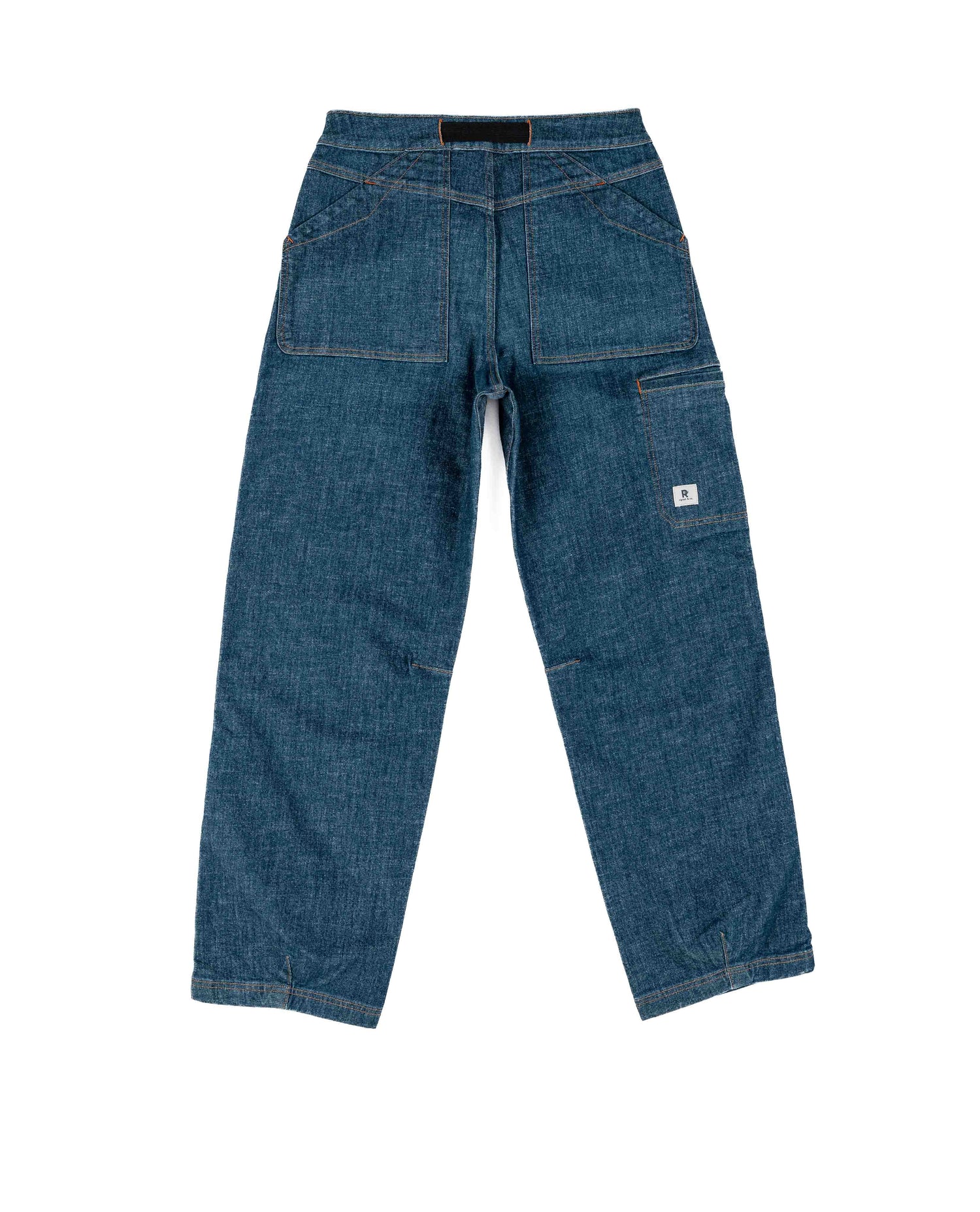 Blue denim work pants on a white background
