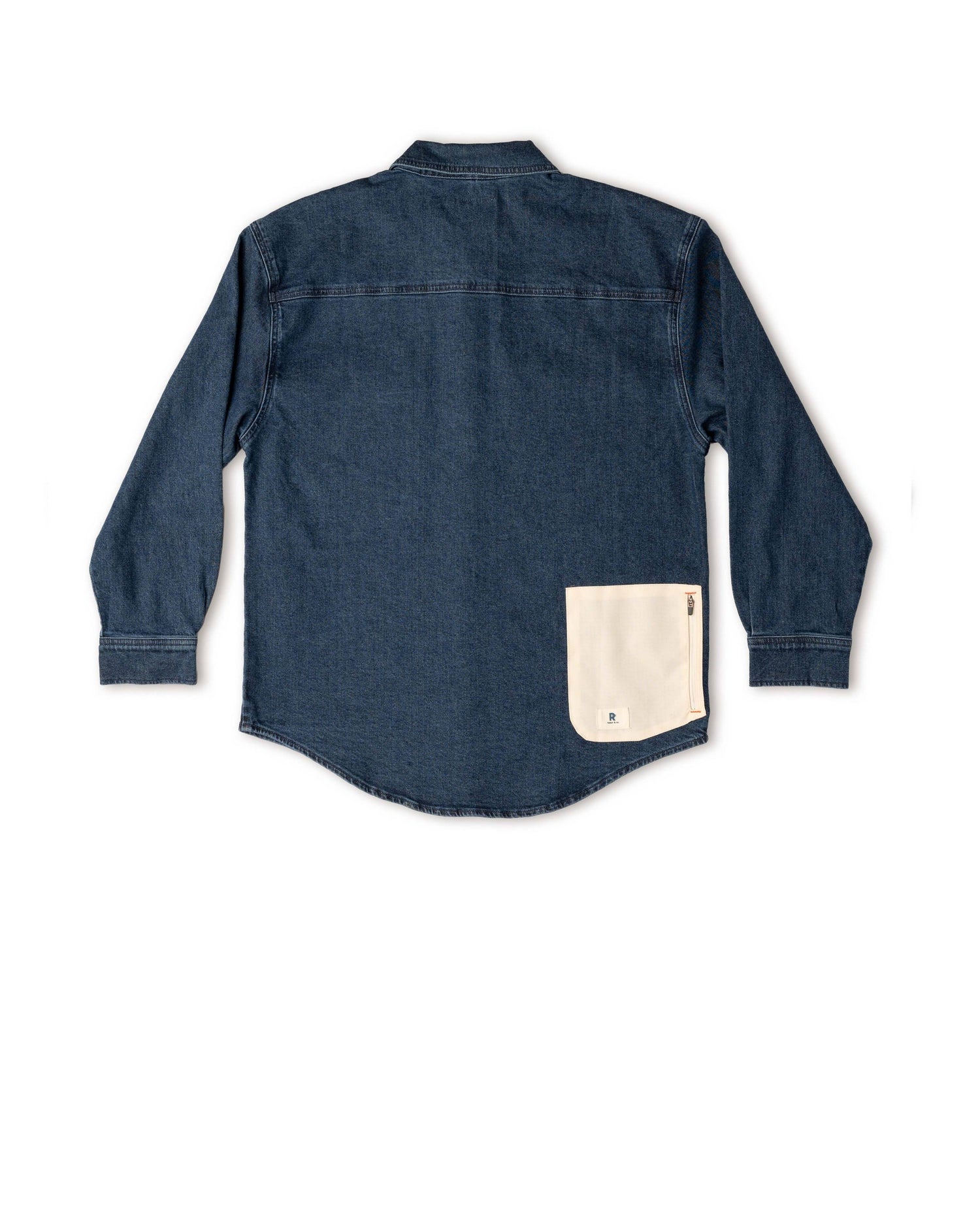 Blue denim shirt with a beige pocket on a white background