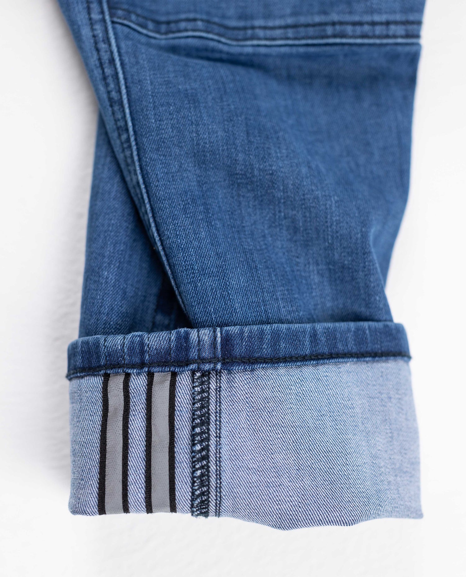 A close up detail of a leg of Ripton jeans with a single cuff.