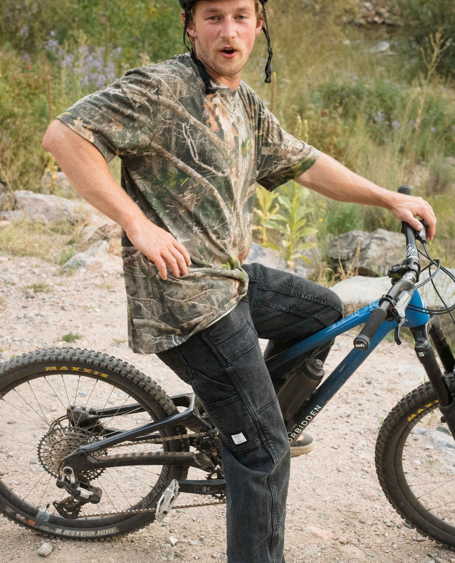 Man riding a mountain bike on a rocky trail