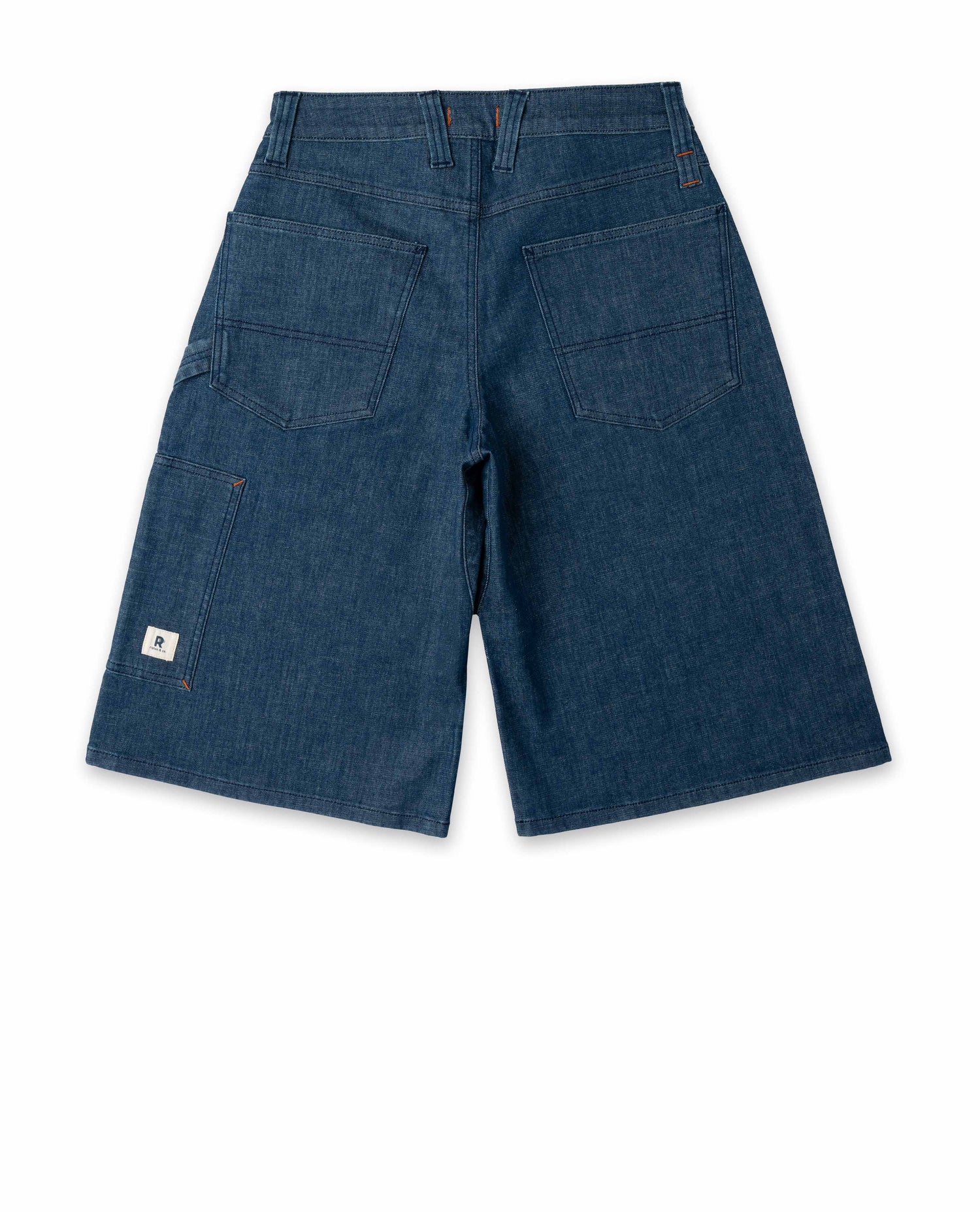 Blue denim shorts on a white background