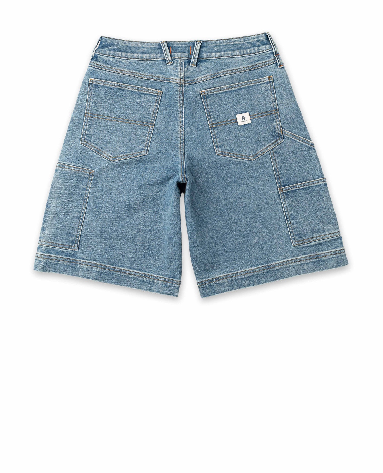 Blue denim shorts on a white background