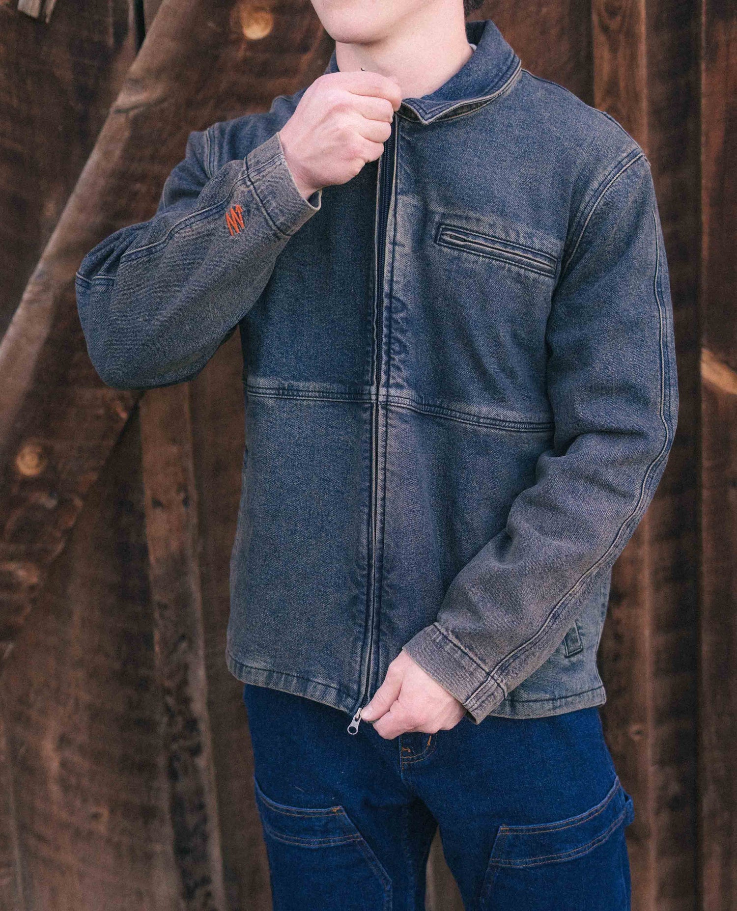 Man wearing dirty dave denim utility jacket.