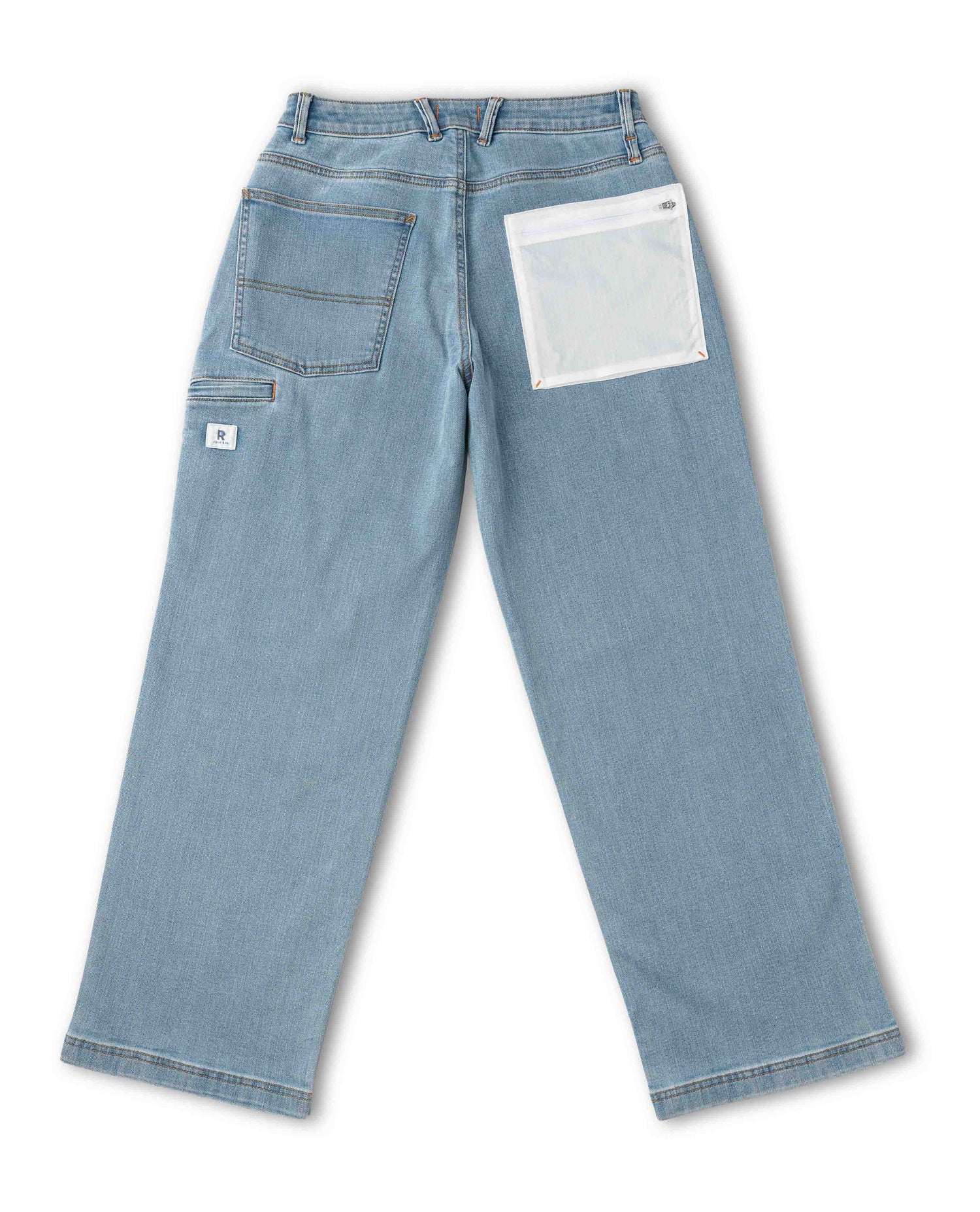 Light blue jeans with a white patch on a white background