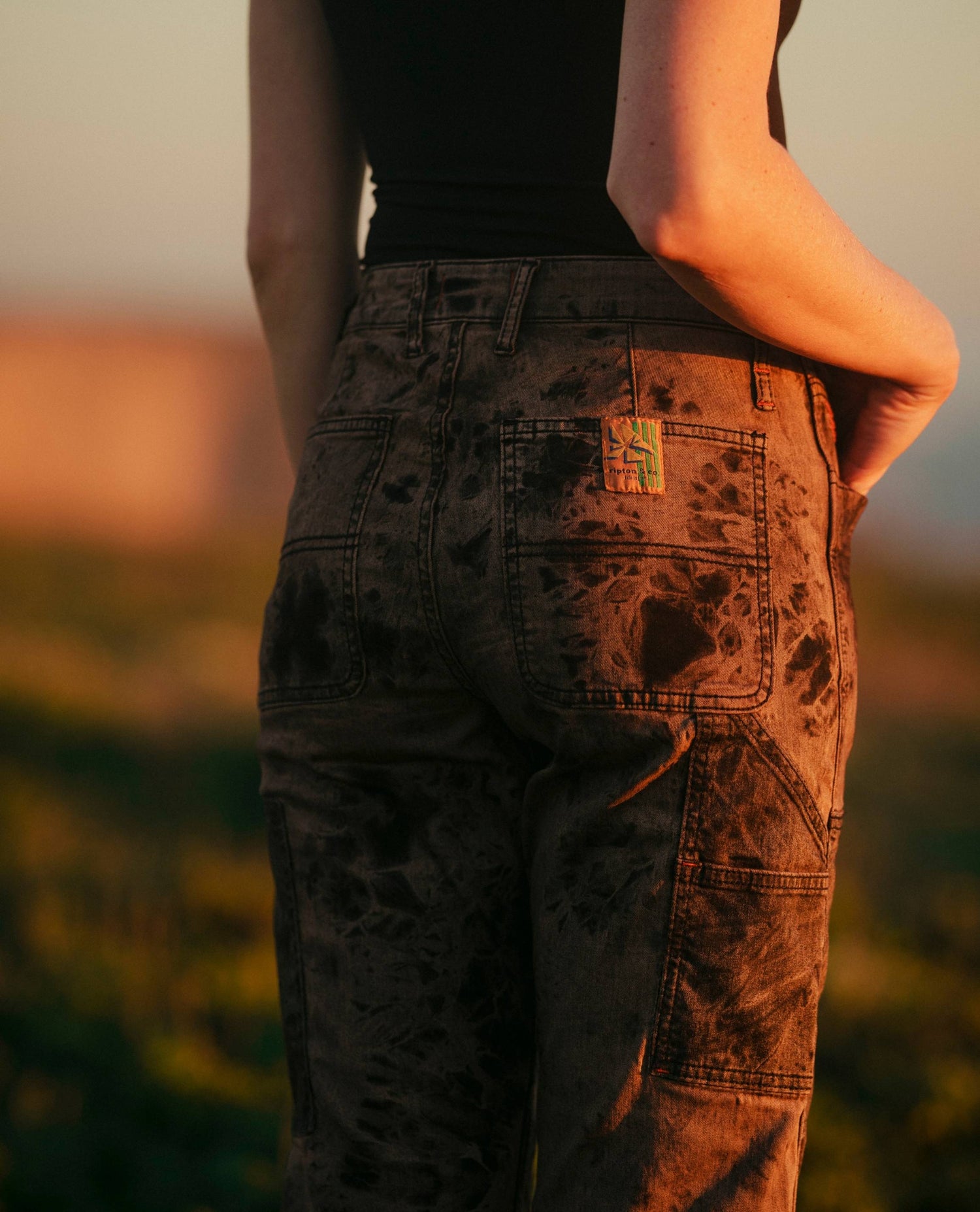 Close up of Mixed Nuts women's Superlite Utility Jeans on body
